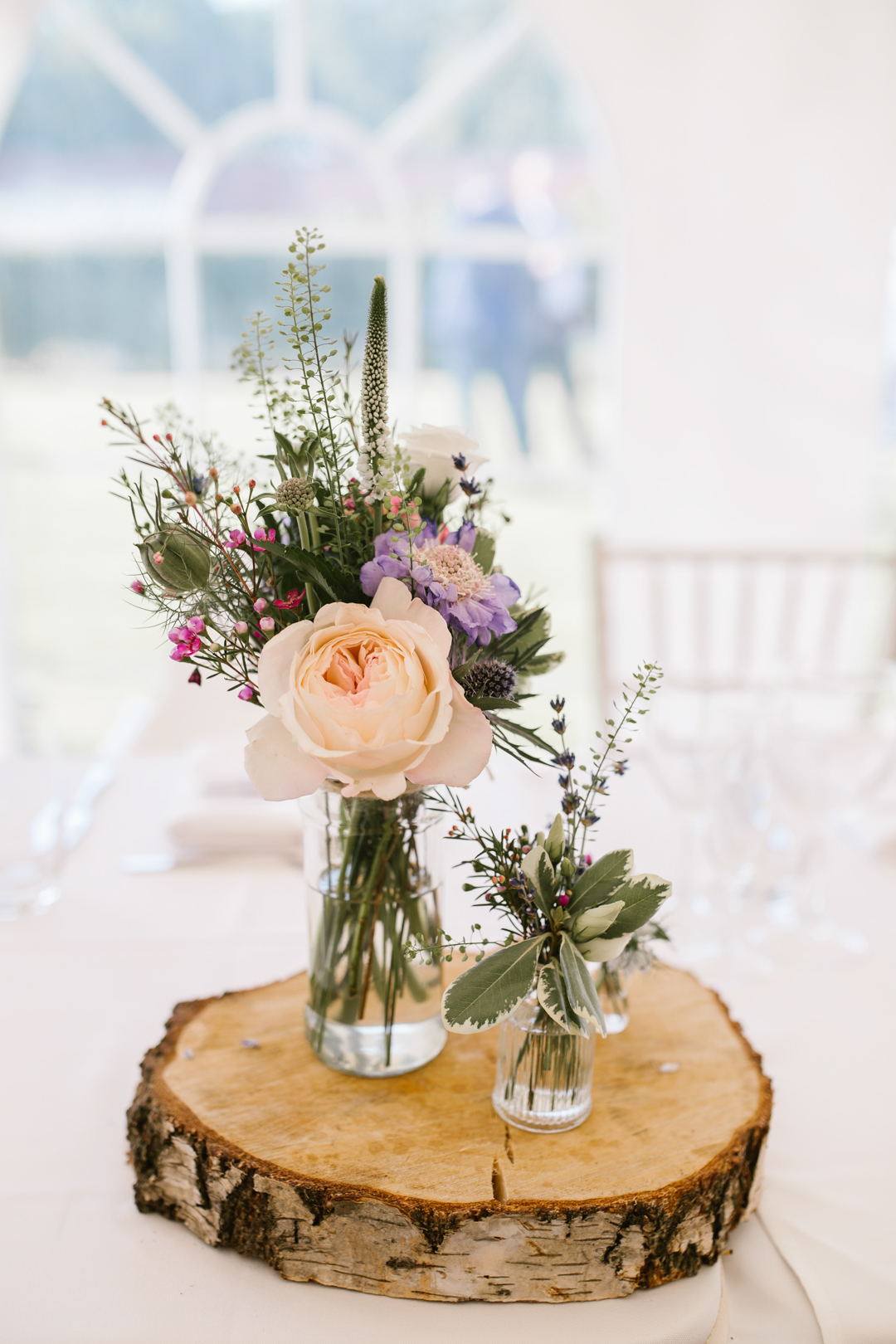 wedding details of centre pieces of wild flowers at nottingham wedding at the walled garden