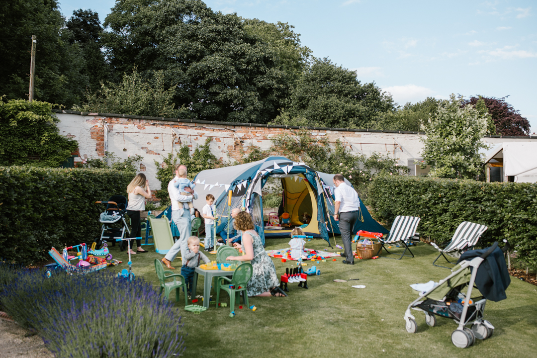 a tent set up for children to play at a summer wedding in nottingham at the walled garden beeston fields