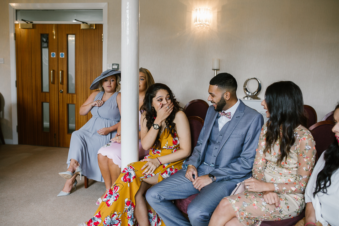 candid photo of wedding guests at intimate lichfield registry office wedding