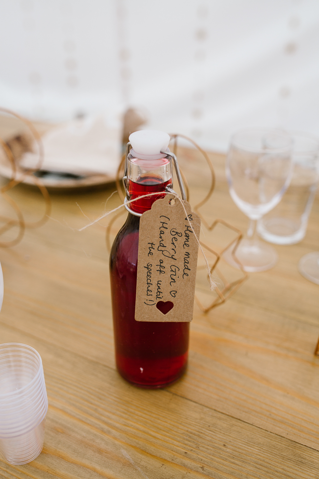 homemade berry gin used as wedding favours