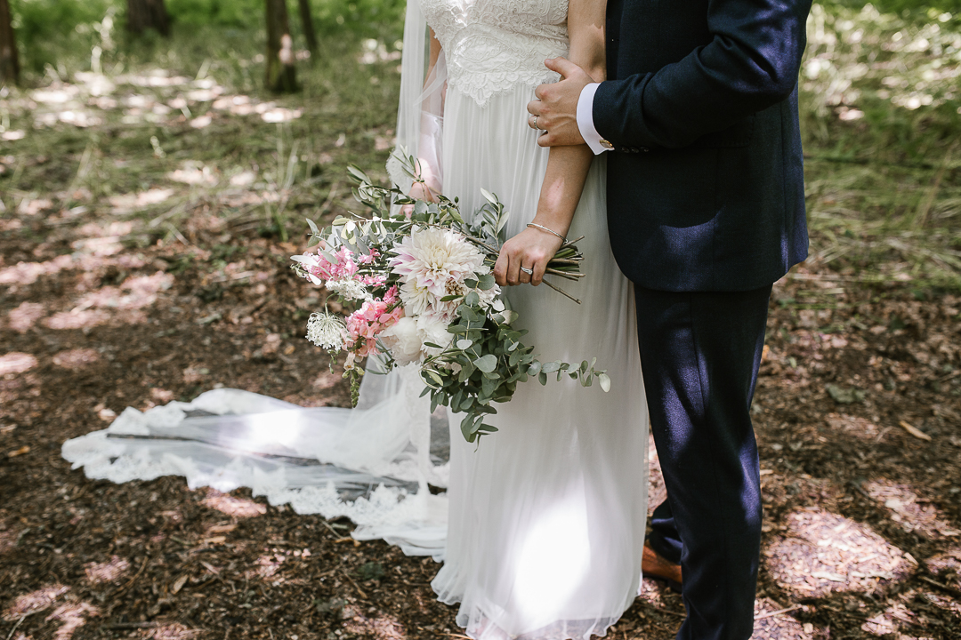 detail photo of wild flowers, anna campbell dress and ted baker suit