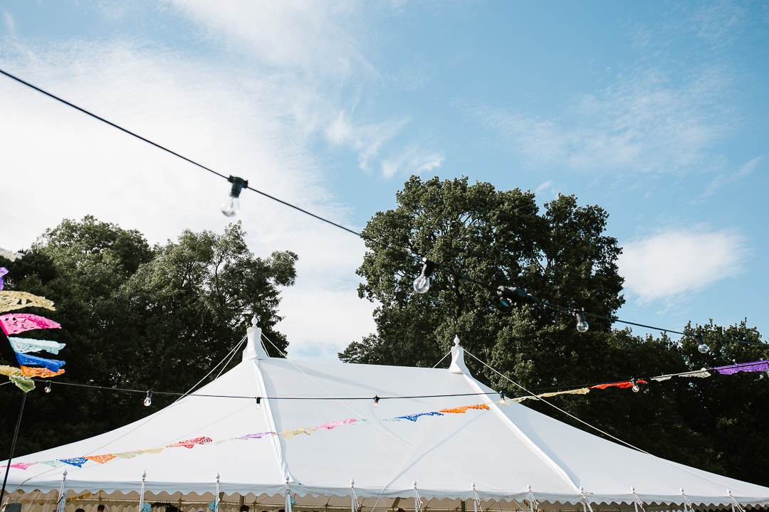 Festoon lights and the top of marquee wedding venue 