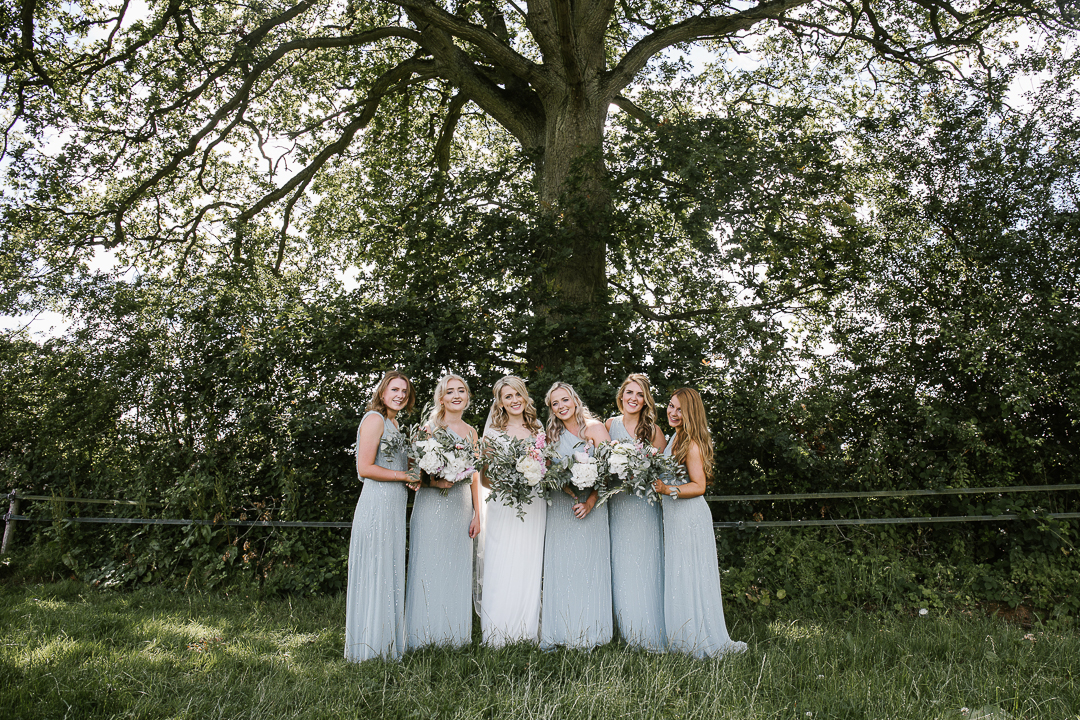 happy photo of bridesmaids wearing asos bridesmaids dresses