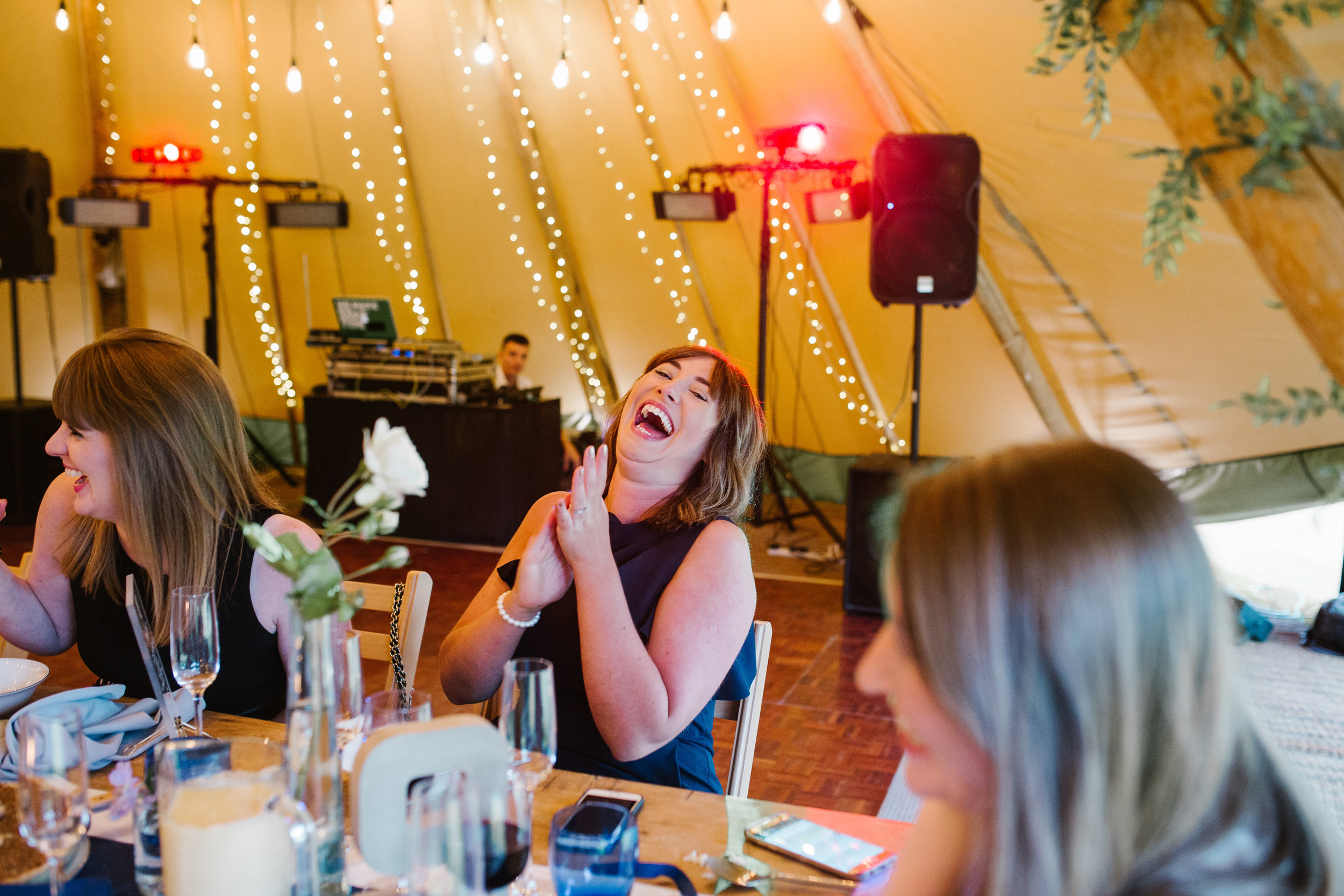 wedding guest laughing out loud