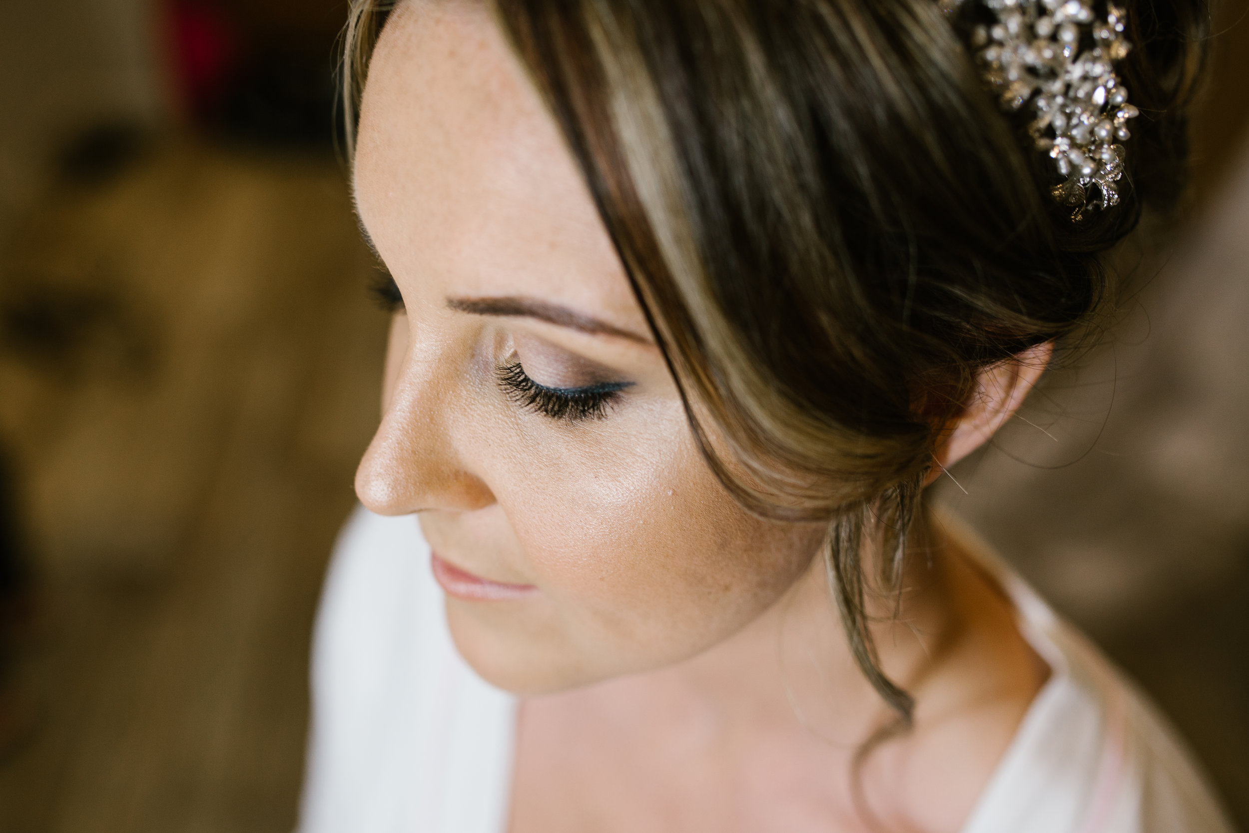 close up photograph of bride on the morning of her wedding day