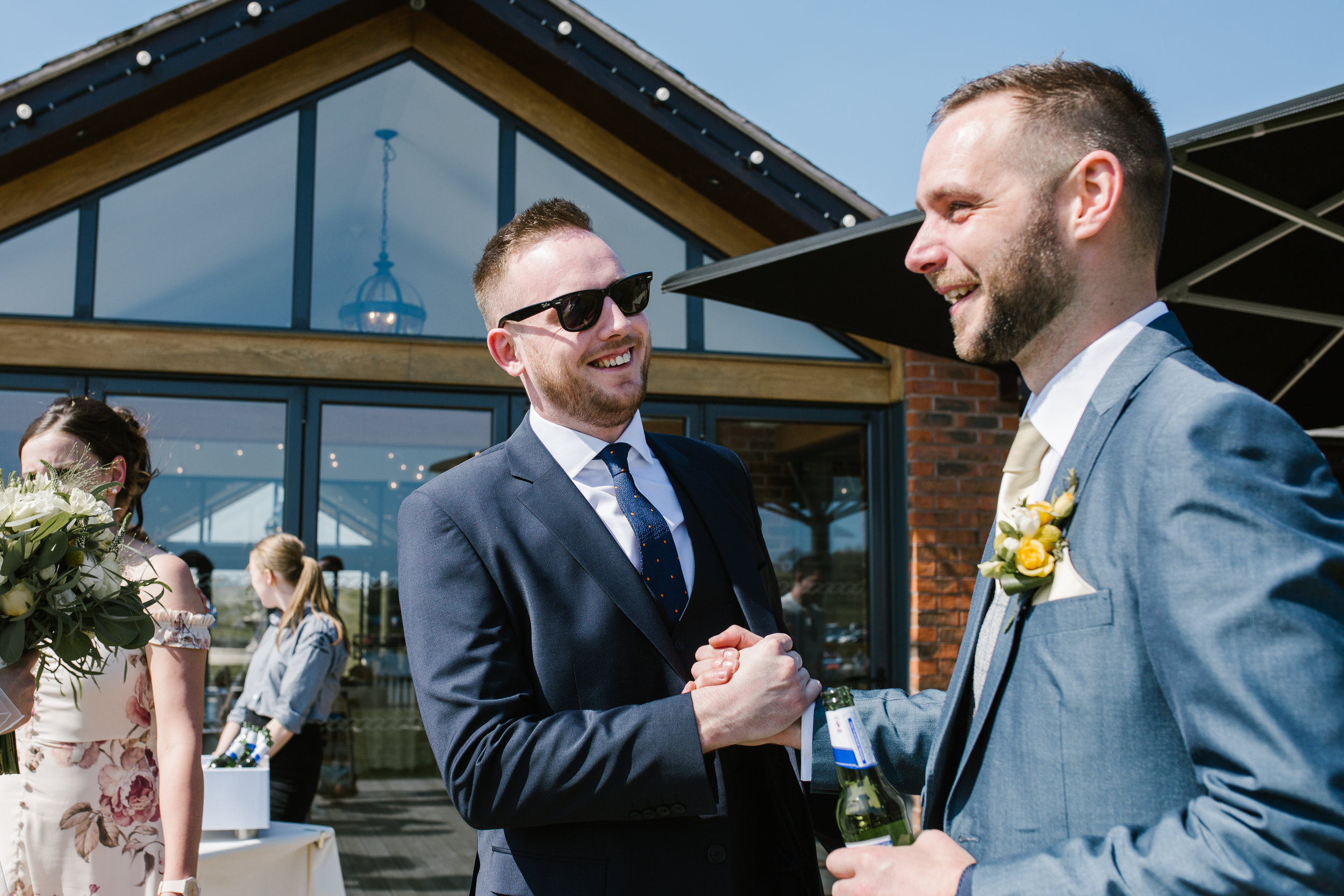 groom greeted by his guests at aston marina 