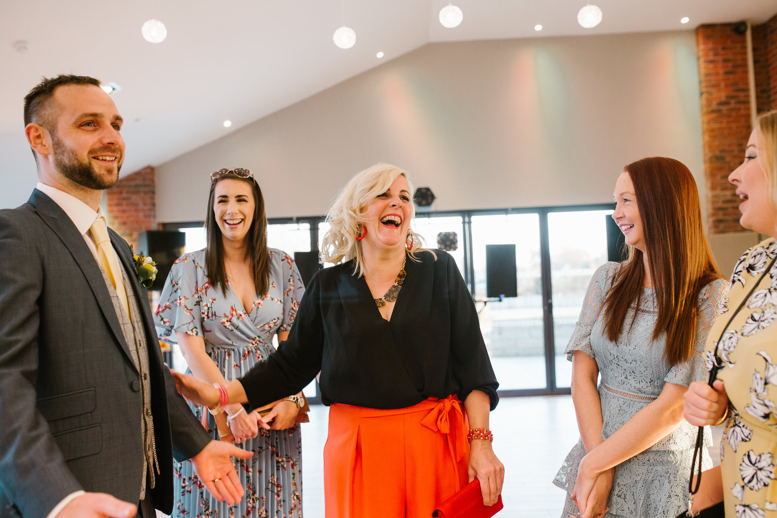 evening wedding guests arrive at a spring wedding at aston marina in staffordshire