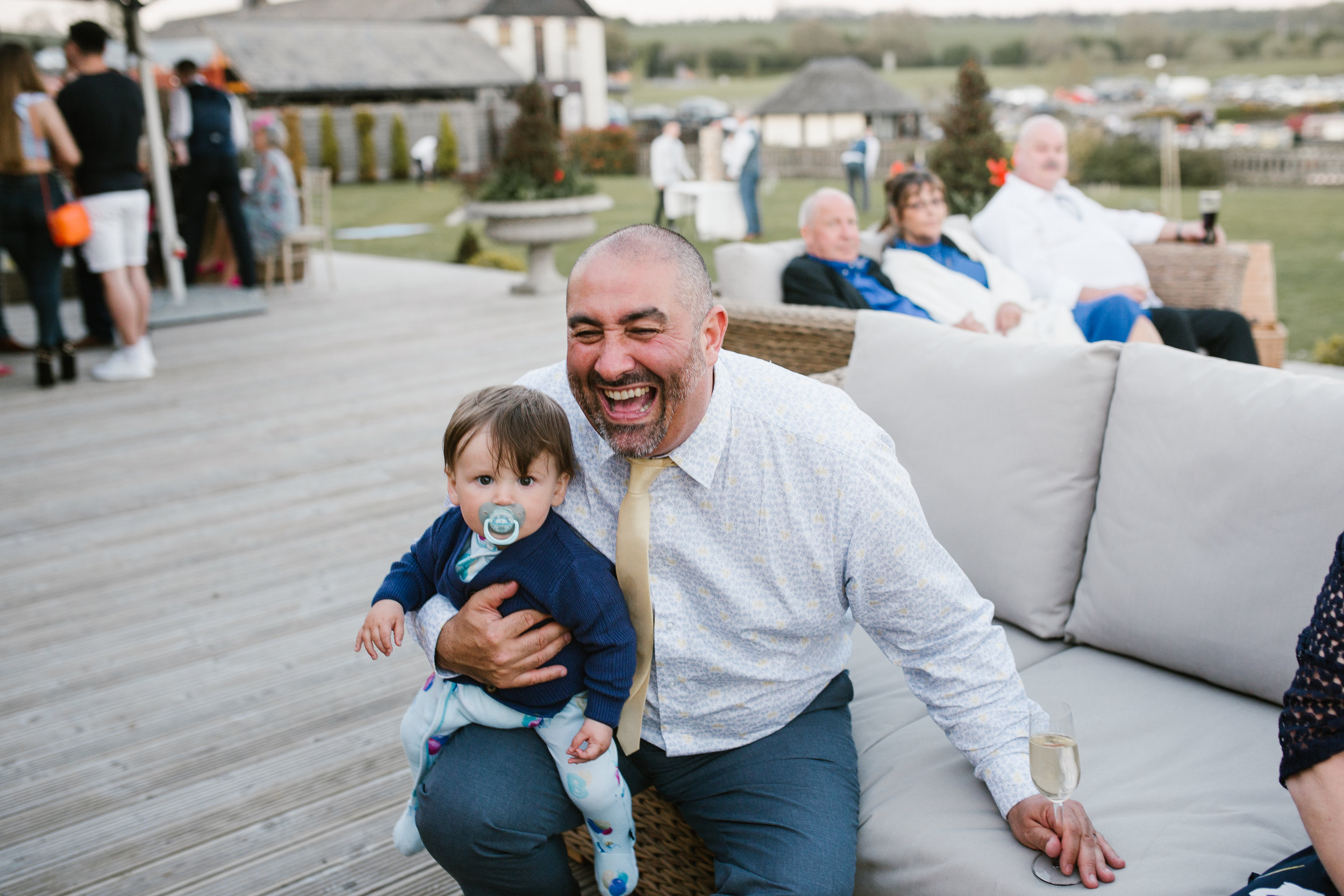 wedding guests laughing uncontrollably 