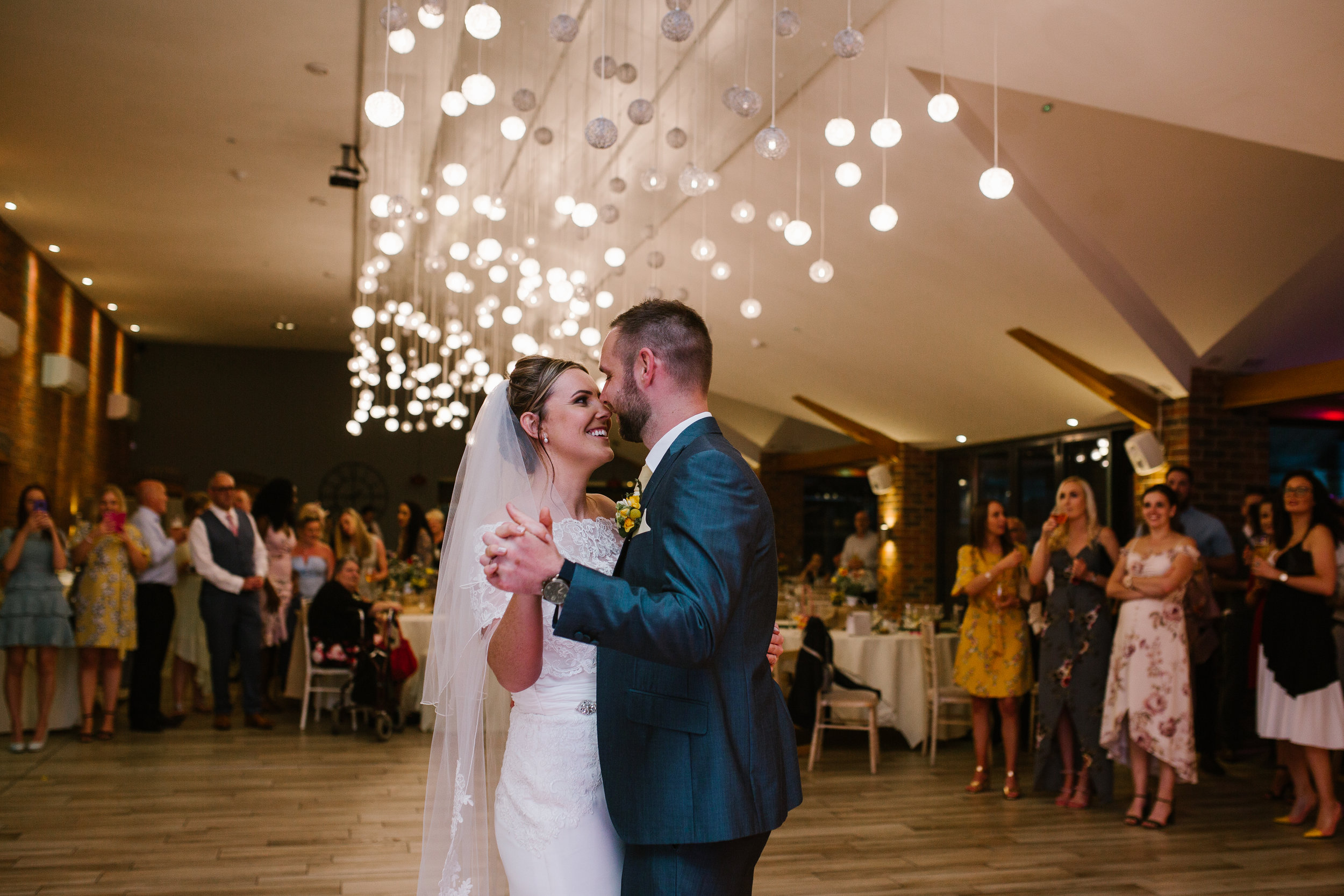 bride and groom dancing together for their first dance to Tom Walker You and I 