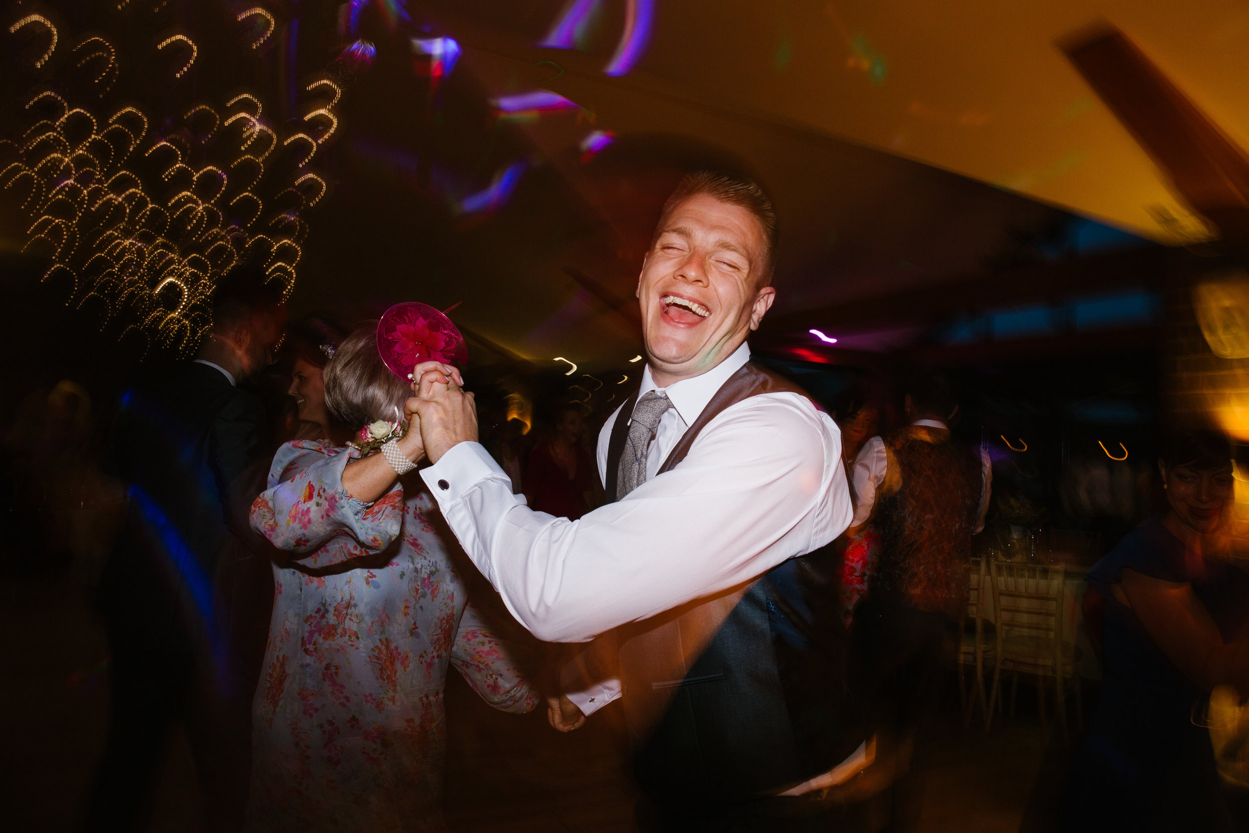 best man dancing on the evening of an awesome wedding