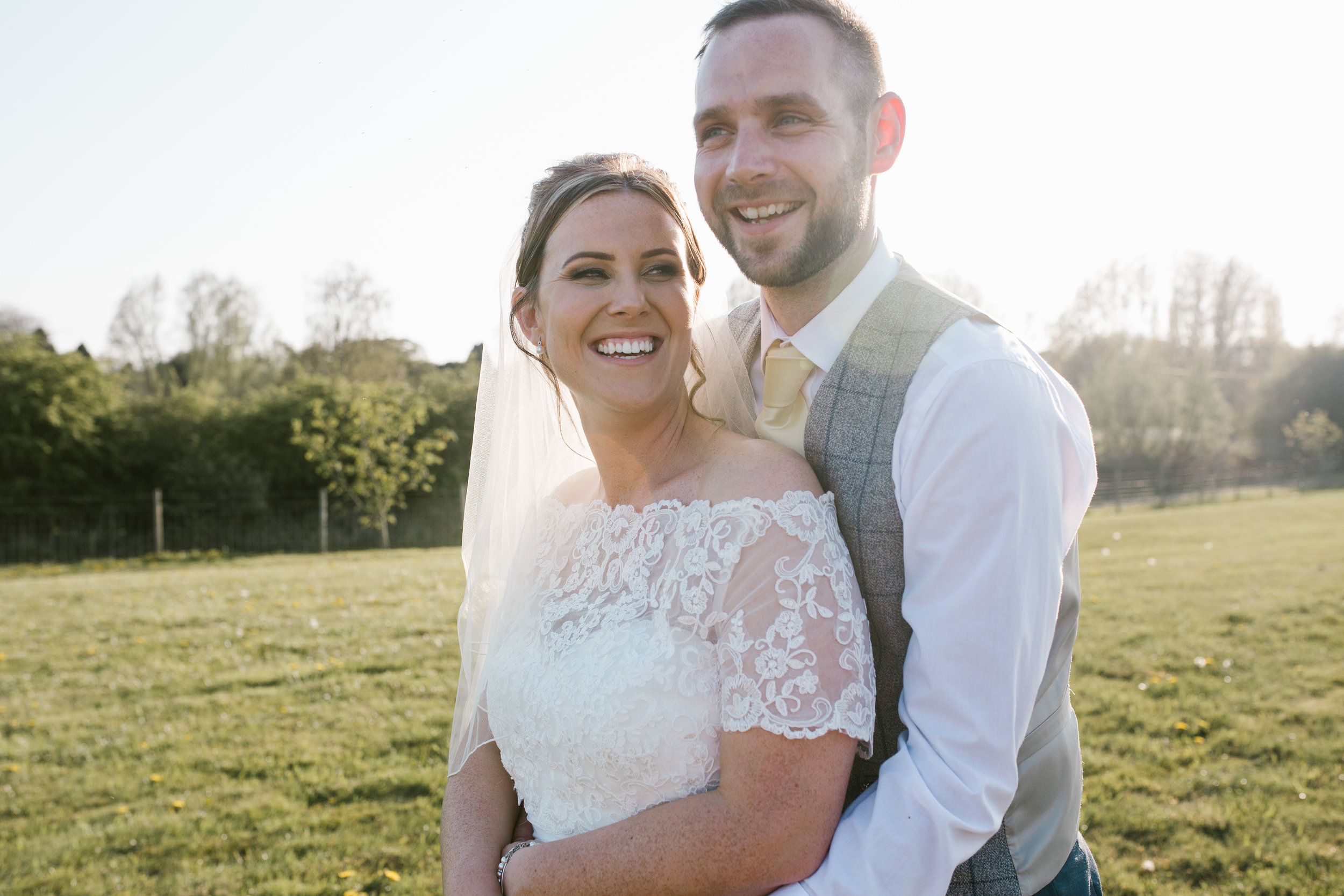 dabbled in the beautiful golden hour light as they hug into one another and smile