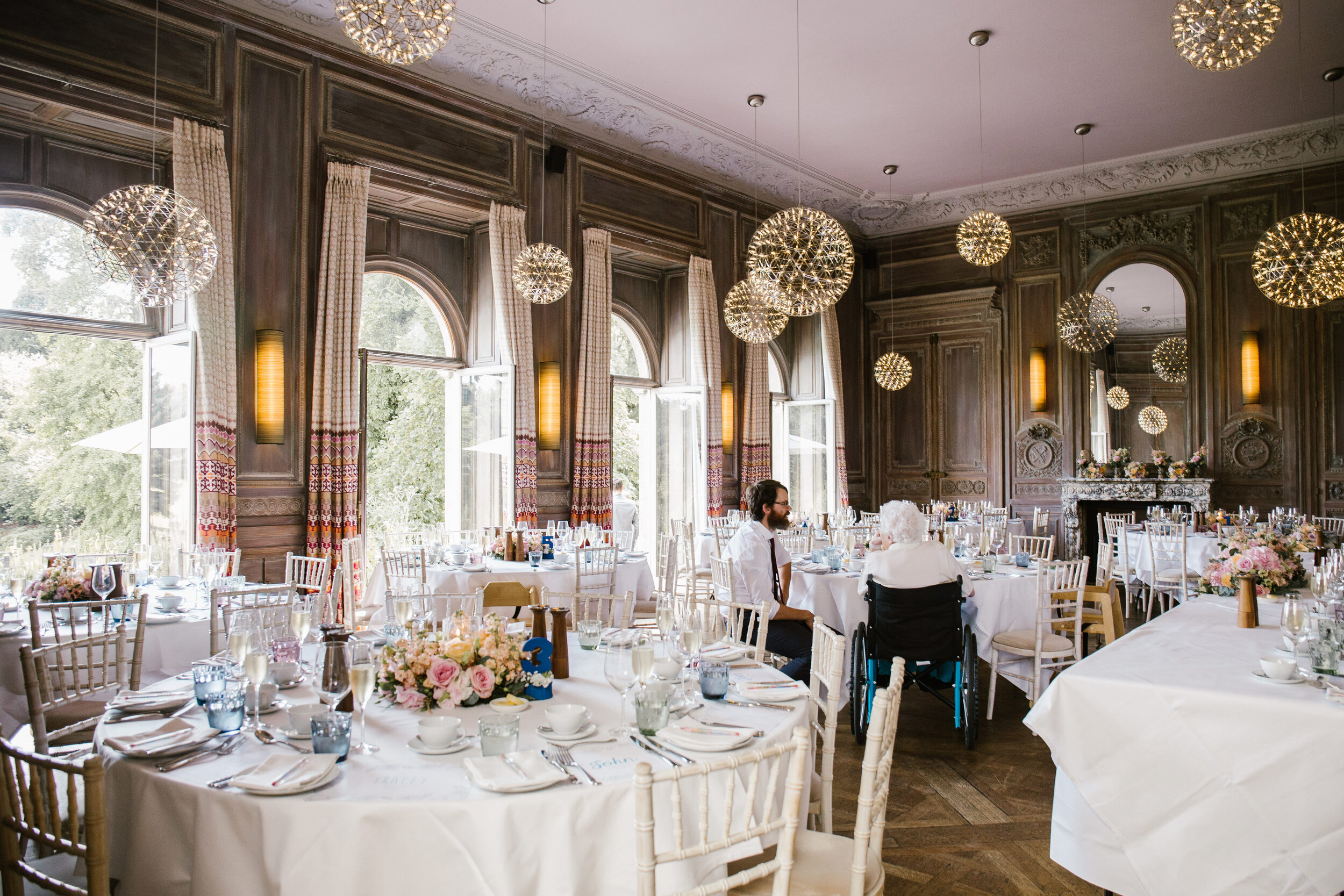 the stunning recpetion room at cowley manor ready for the wedding breakfast