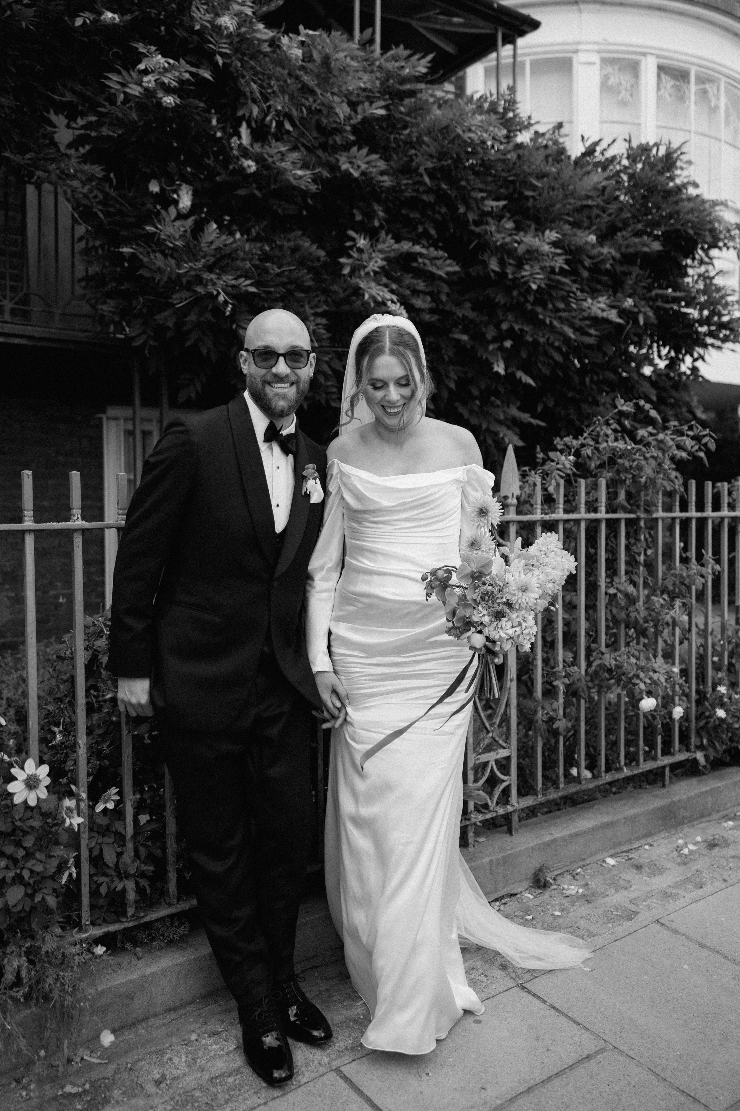 black and white photo of couple laughing in Hammersmith