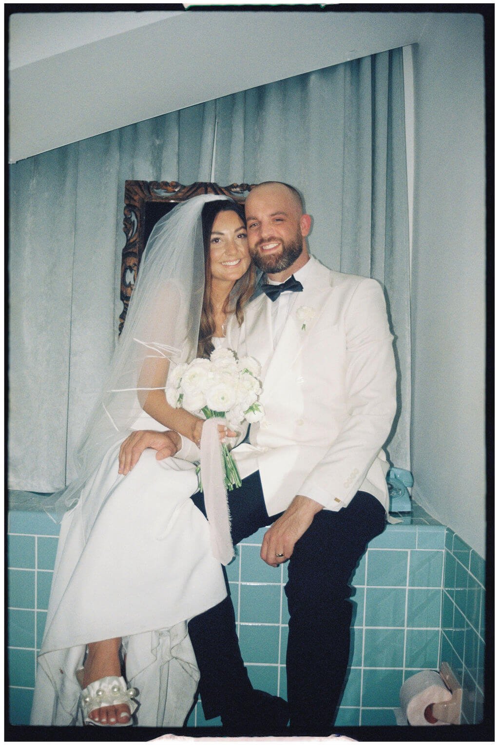 Couple pose at their Las Vegas Elopement in the bathroom