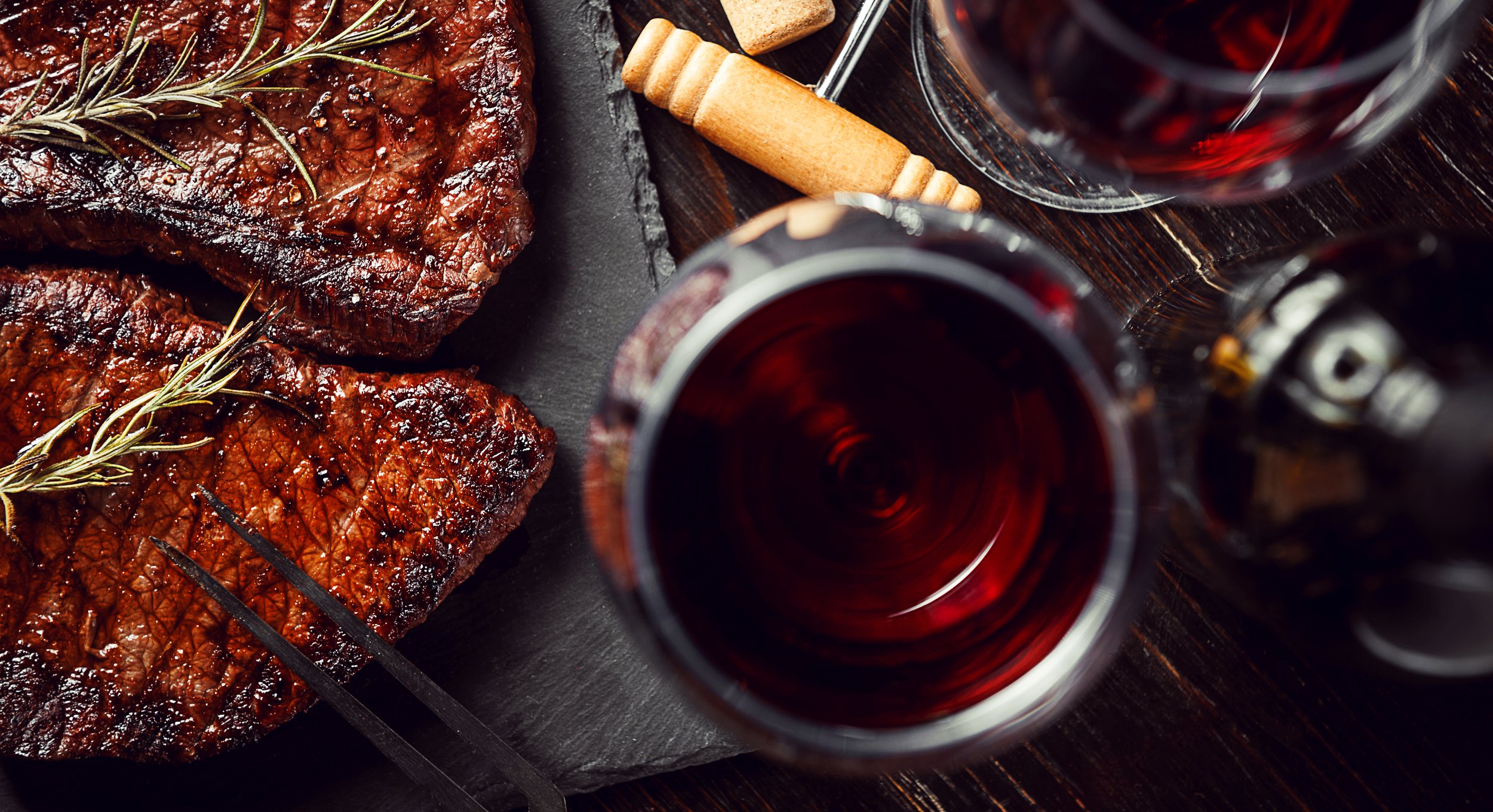 dinner for two with steaks and red wine