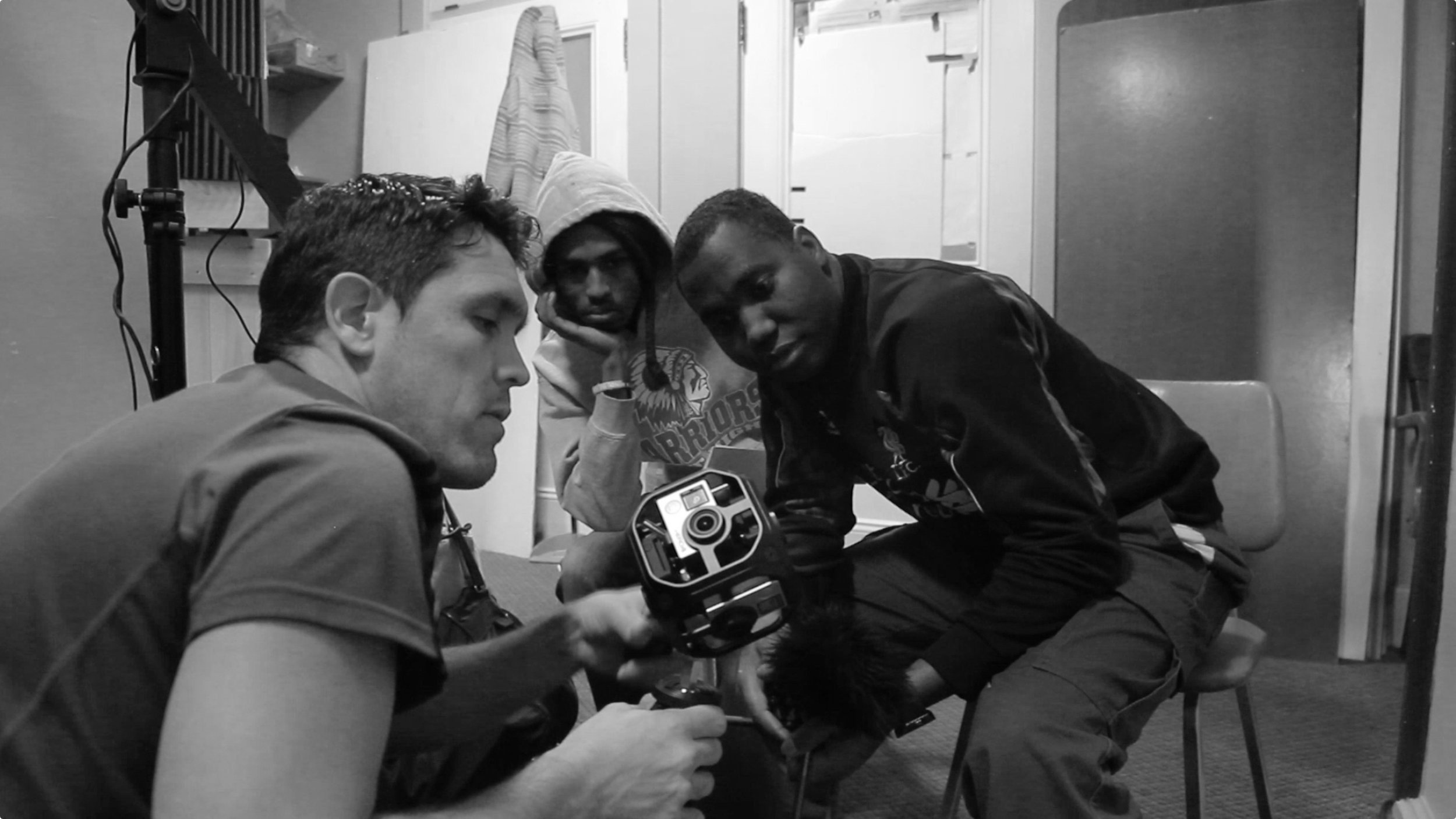 Daniel, Shuab and Hilowle work with special virtual reality cameras to film A Shared Space..jpg