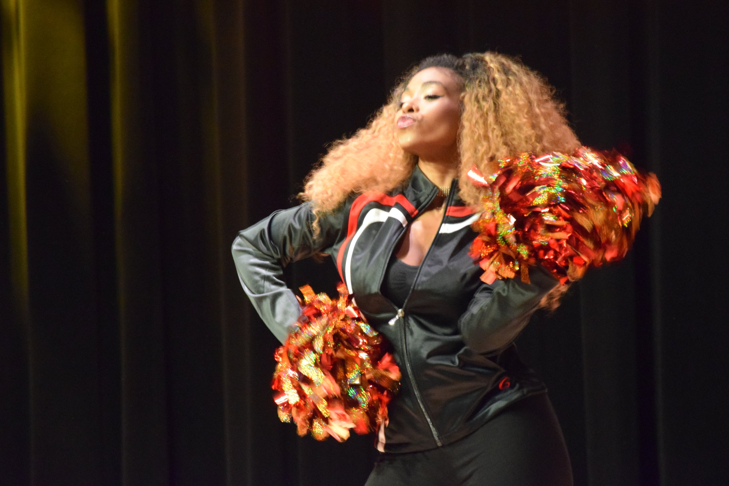 C-Nettles member dances with pompoms at International Dance Night - IS Daily