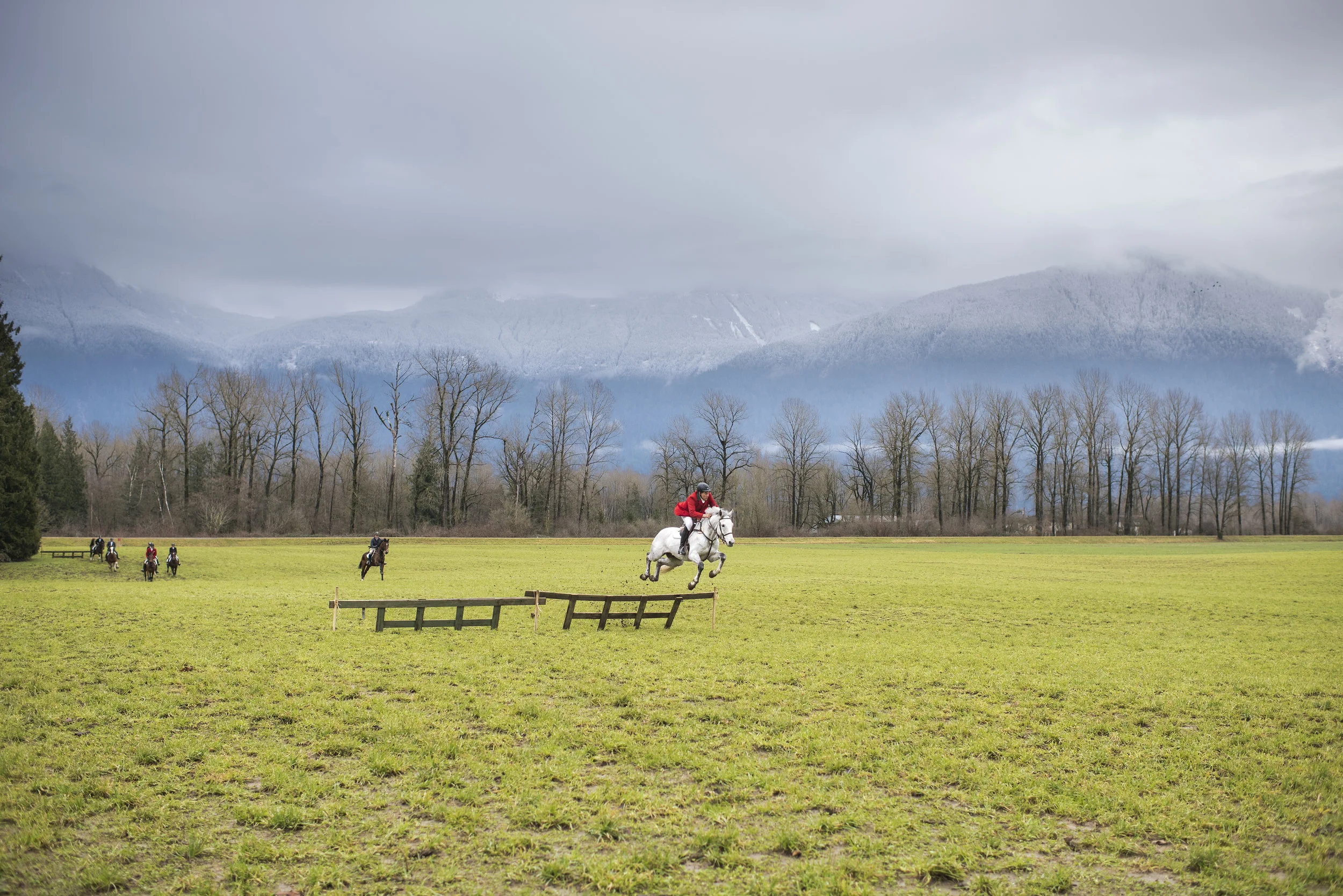  December 26, 2014 - Agassiz, BC - Dr. Raymond Wise, Joint Master of the Fraser Valley Fox Hunt leads the hunt. Photo by Jimmy Jeong 