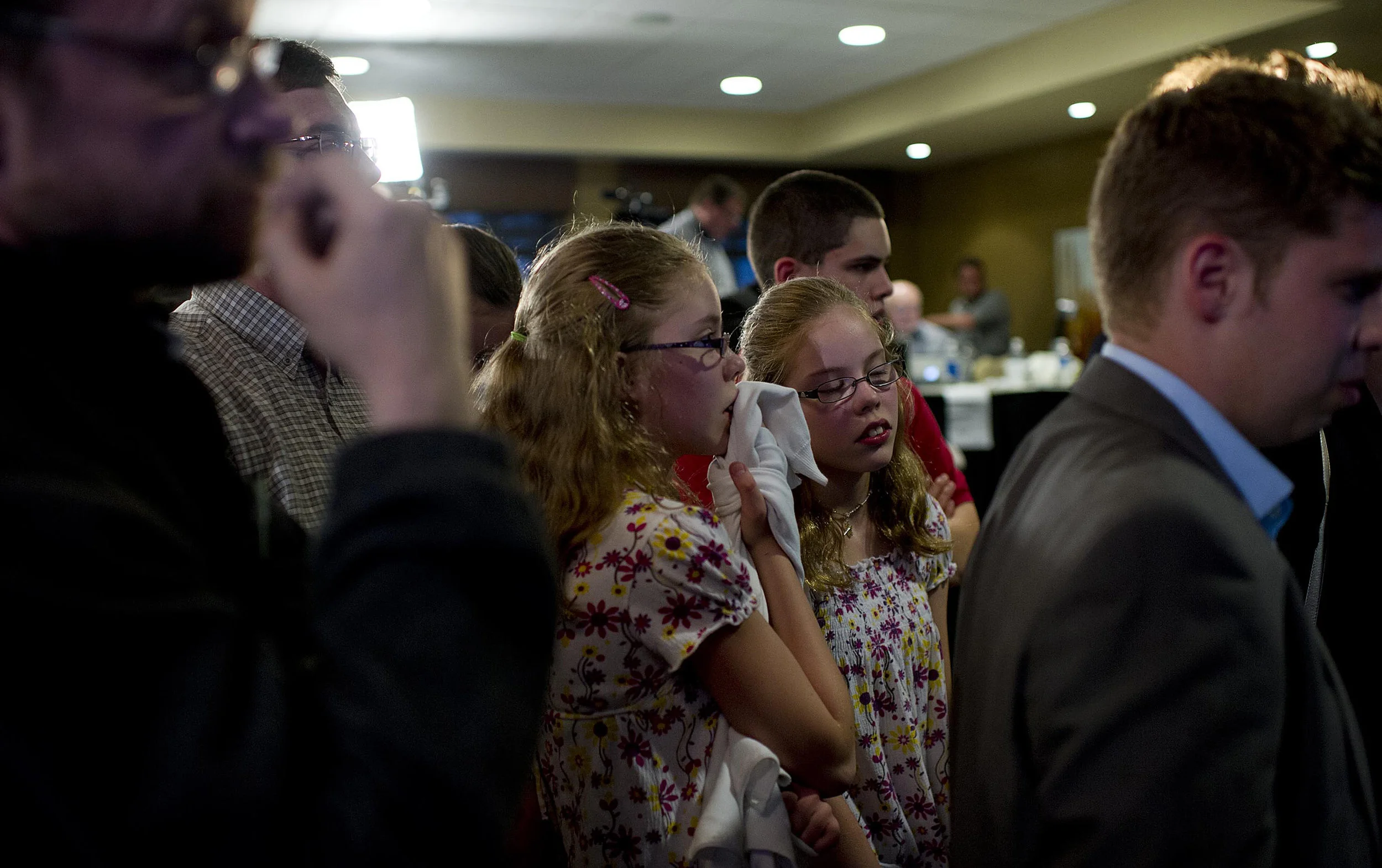 Alberta's Wildrose Party supporters react as voting numbers come in at their campaign headquarters the night of the provincial election at the High Level Golf and Country Club in High Level, Alberta on April 23, 2012. 