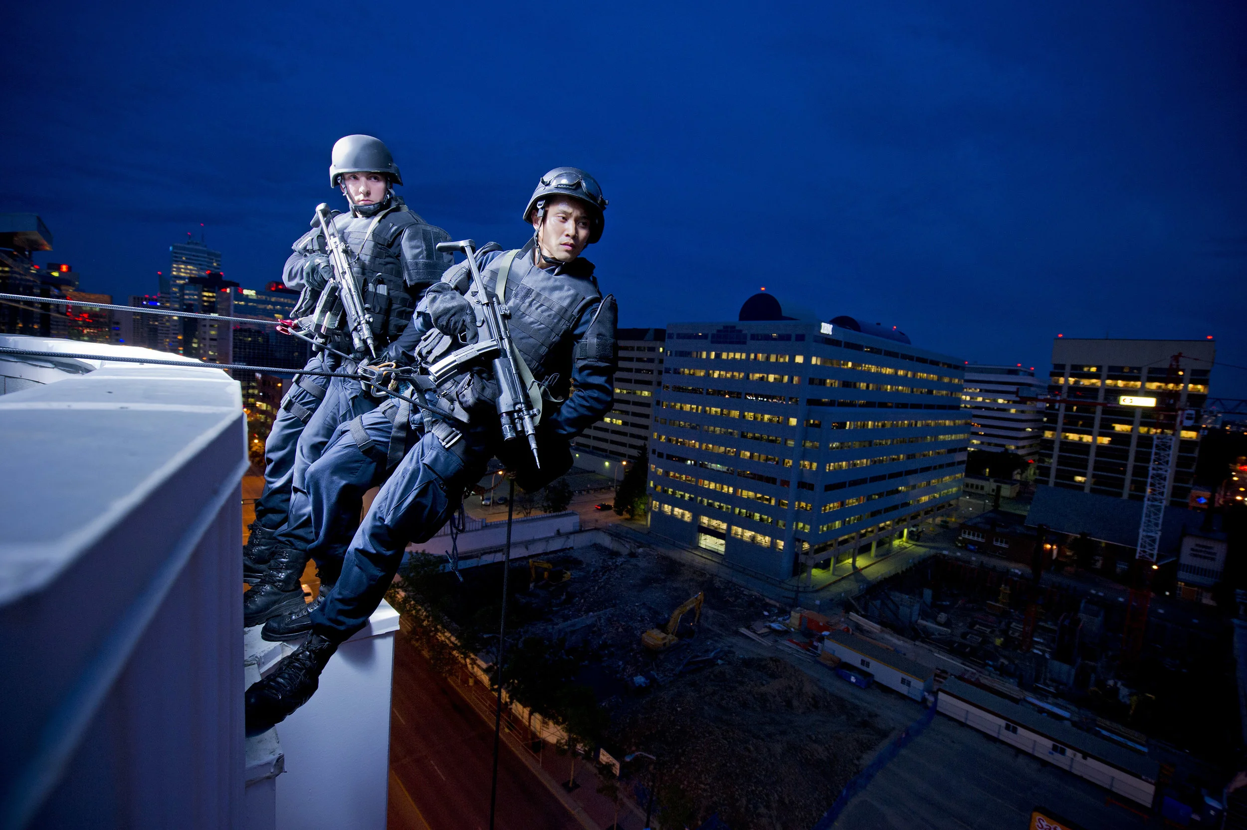 Photos of police tactical team training on a downtown tower. PHOTO BY JIMMY JEONG