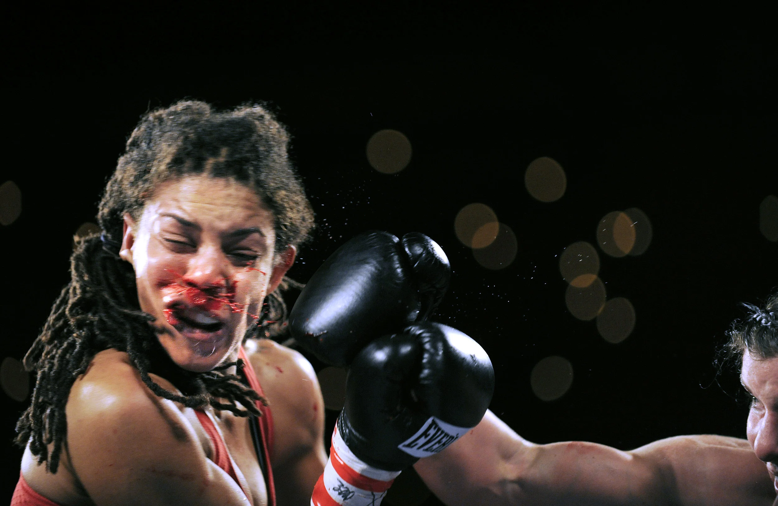  Lindsay Garbatt, from Ontario, (pink shorts) fights Ayana Pelletier, from Edmonton, during the KO Boxing's Redemption fight card at the Shaw Conference Centre. PHOTO BY JIMMY JEONG 