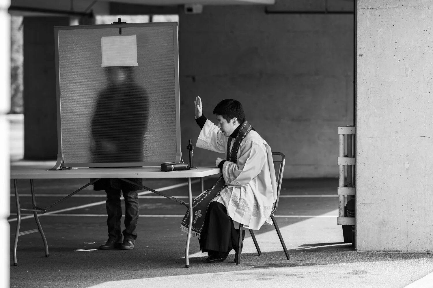  February 26, 2020 - Vancouver, British Columbia - Father Felix take drive-thru confessions at St Patrick’s Parish. Photo by Jimmy Jeong 
