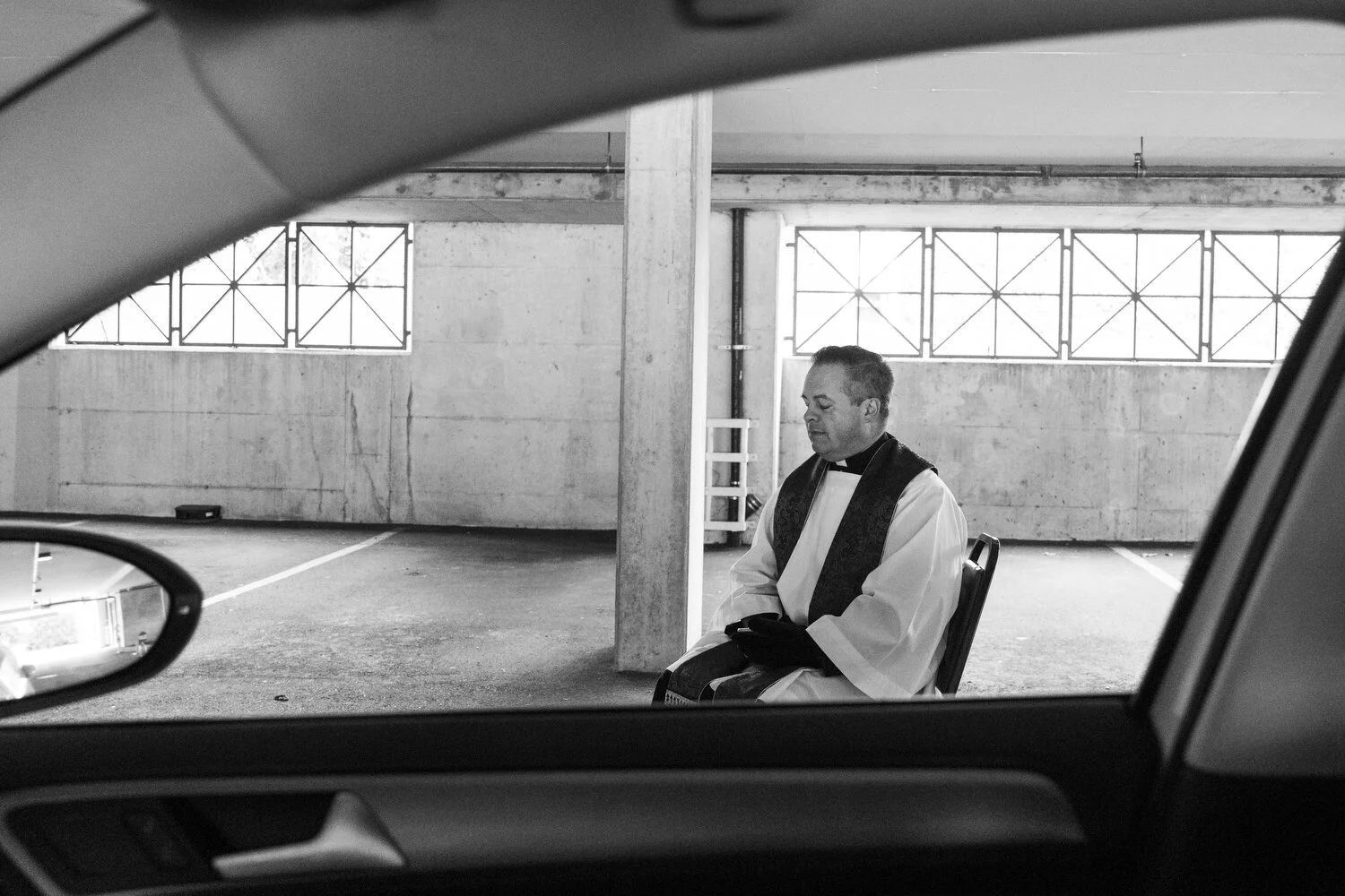  February 26, 2020 - Vancouver, British Columbia - Father James take drive-thru confessions at St Patrick’s Parish. Photo by Jimmy Jeong 