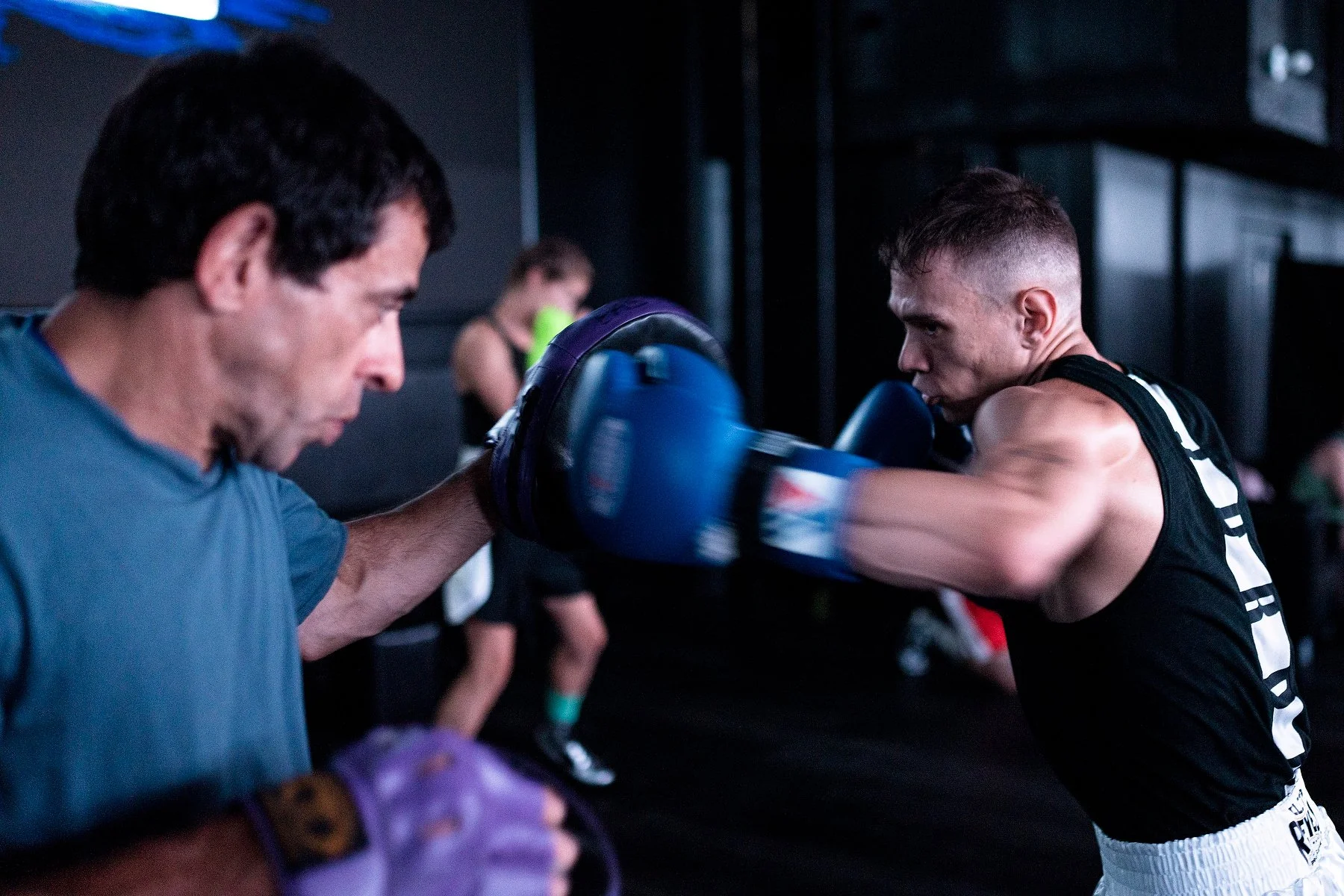  Colin Pallos, on right, warms up before his match in the 10th annual Restaurant Rumble organized by the Aprons for Globes Boxing Association in Vancouver, B.C., on August 25, 2022. The fundraiser was originally started to help build the Eastside Box