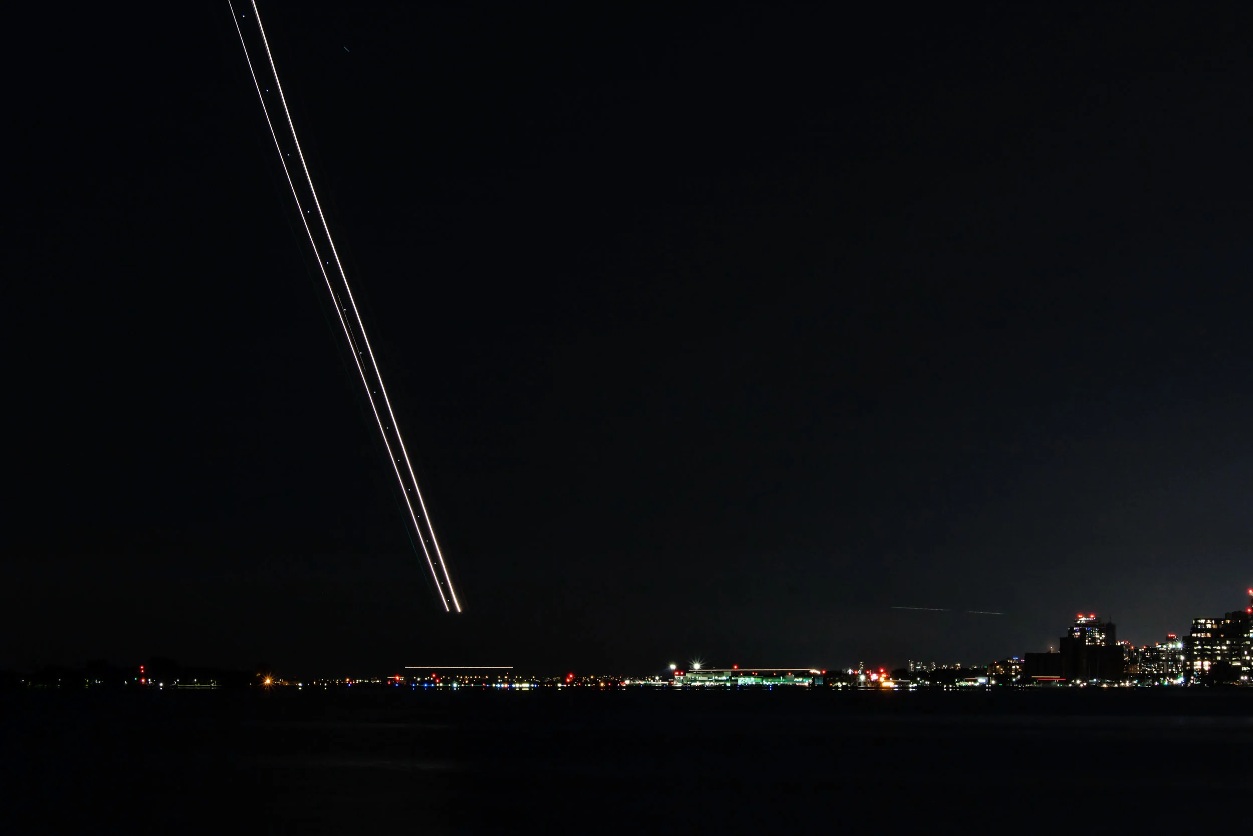 A plane landing at night