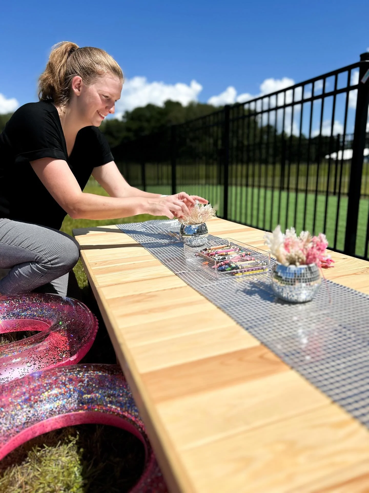 Just one ✨sparkly✨ piece of today&rsquo;s Barbie Dreamland birthday! 💕 I surprised the birthday girl with this mini version of my luxury picnic setup complete with disco ball runners, pressed flower centerpieces, and pink sparkle pool rings for seat
