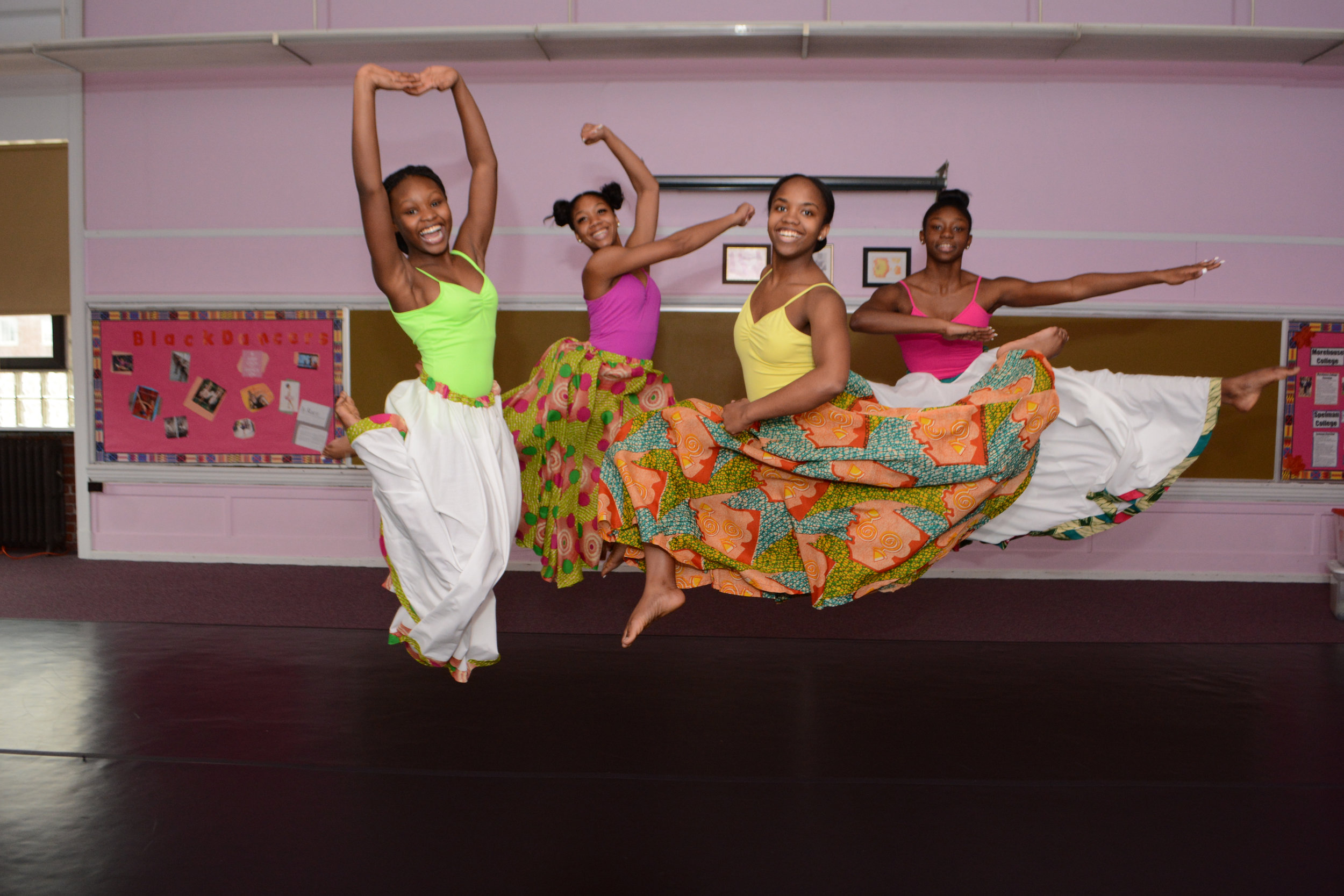  Jump for Joy! HDAT students celebrate after completing rehearsal for an upcoming concert 