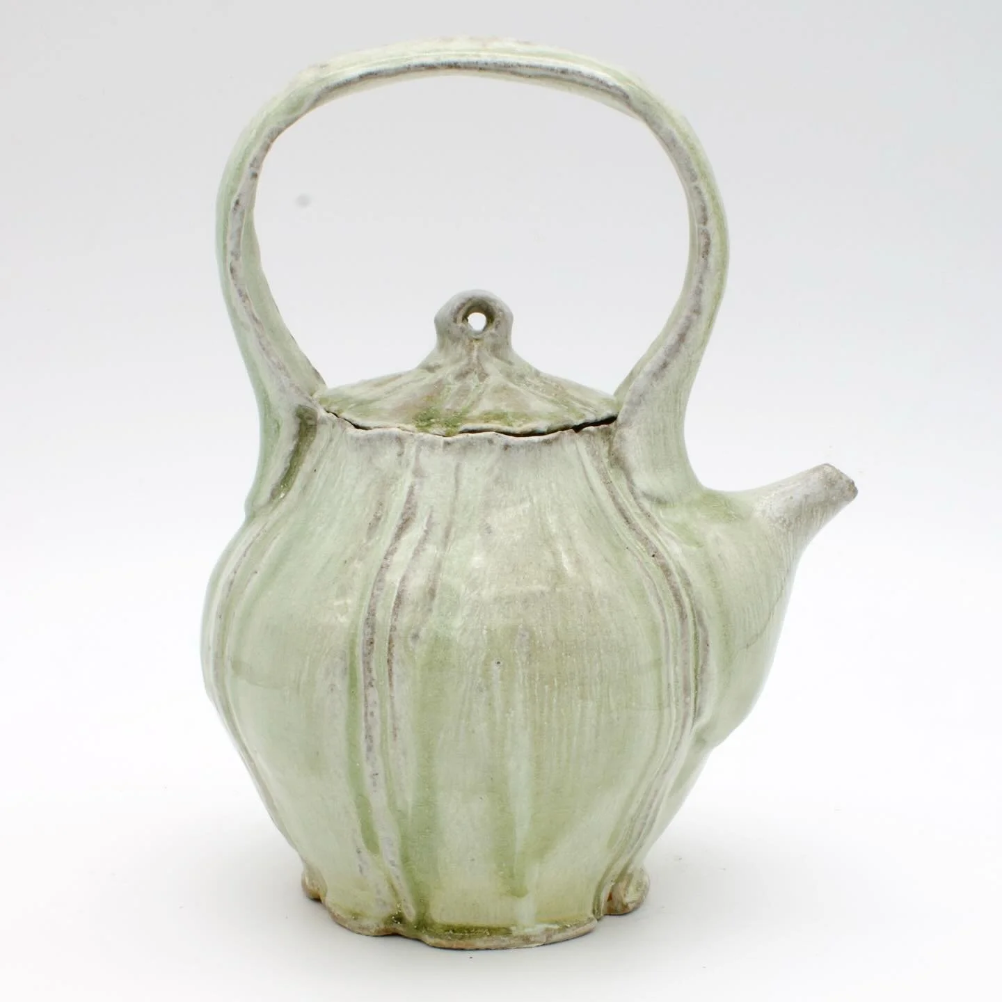 Teapot with ash glaze that came out of the @mizzou_svs @mu_ceramics catenary arch wood kiln! 
This piece was positioned by the flue so i was very happy that it came out so well from the firing (it probably got to cone 10-11 down there)!
.
.
.
.
.
#po