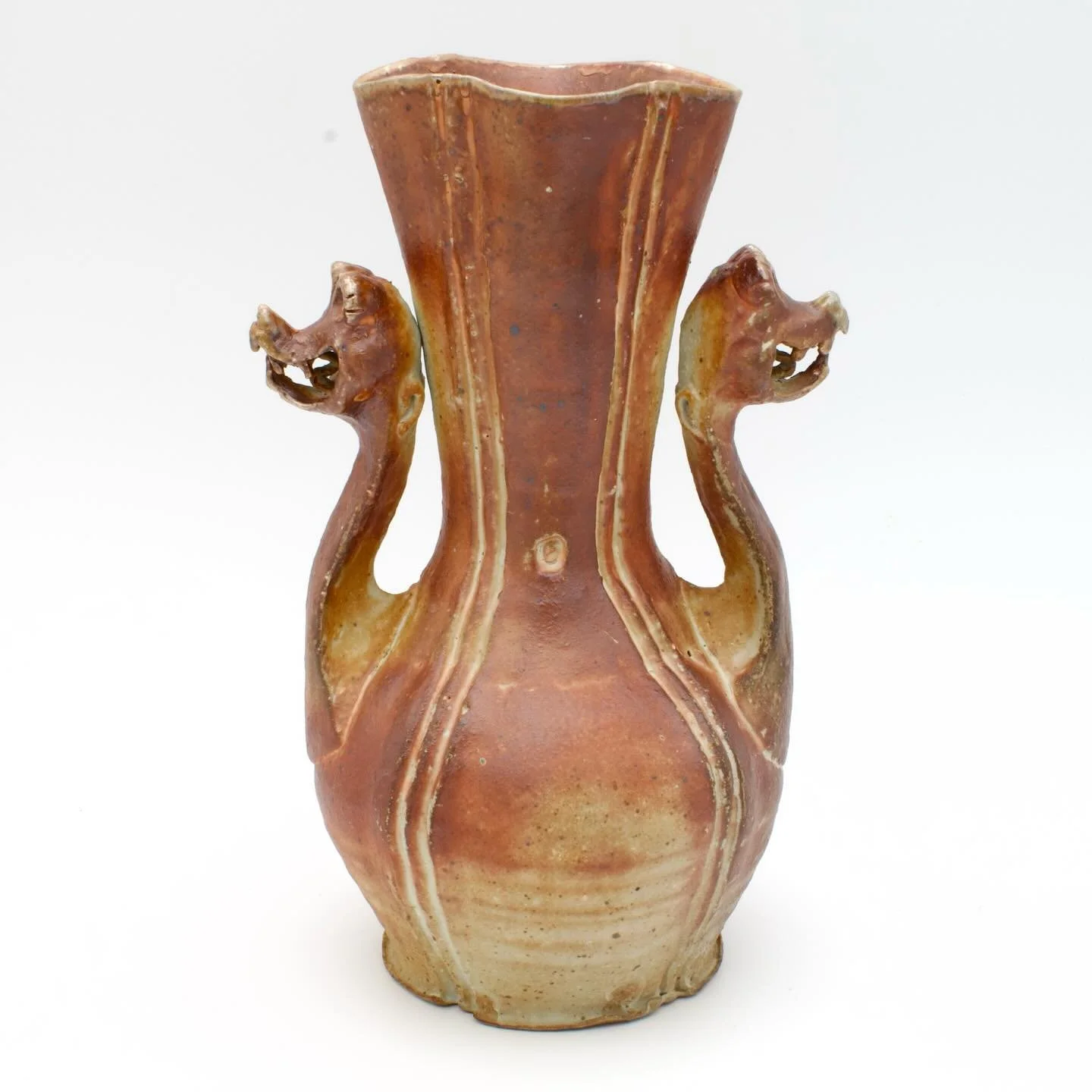 My favorite piece from the recent @mu_ceramics firing! 
Stoneware clay w / Thiele Flashing slip, fired in the soda kiln to cone 12 (heavy reduction), 11.25&rdquo;x6.75&rdquo;x5.25&rdquo;
These heads sometimes feel a little like Wallace &amp; Gromit o