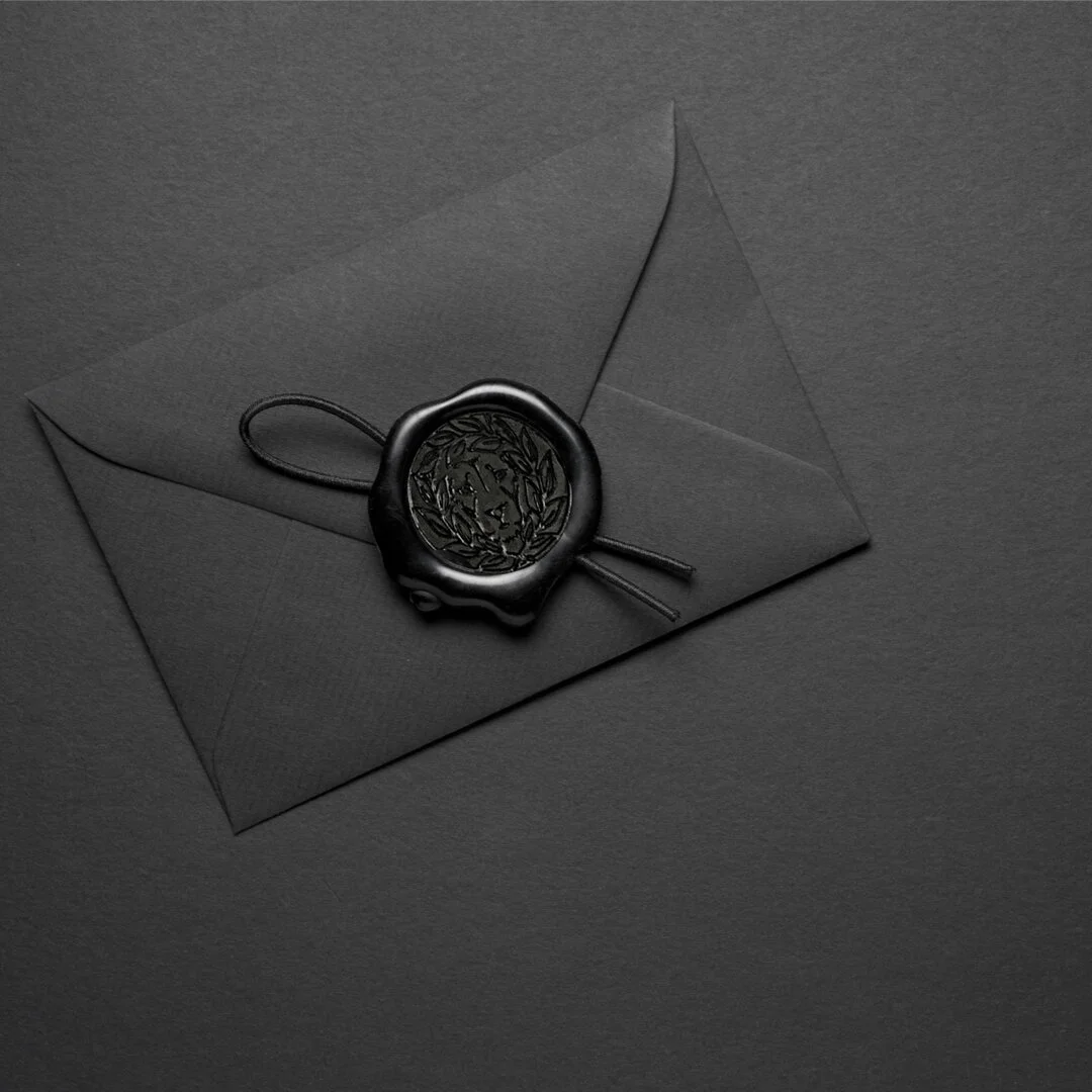a picture of a black envelope with a black wax seal, Luxury Fragrance Candles, Leone Collection
