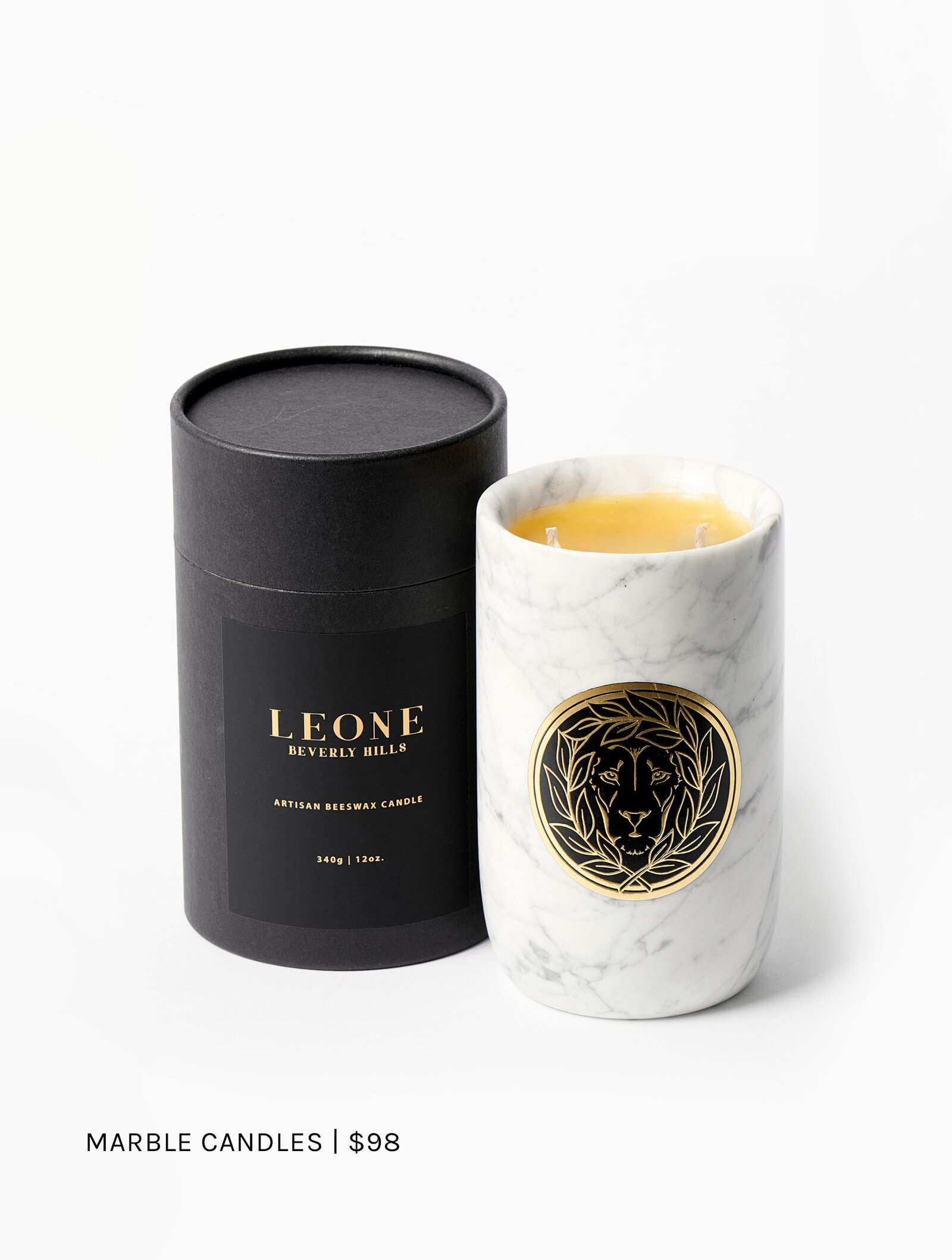 a white candle next to a black case, Organic Beeswax Candles, Leone Collection