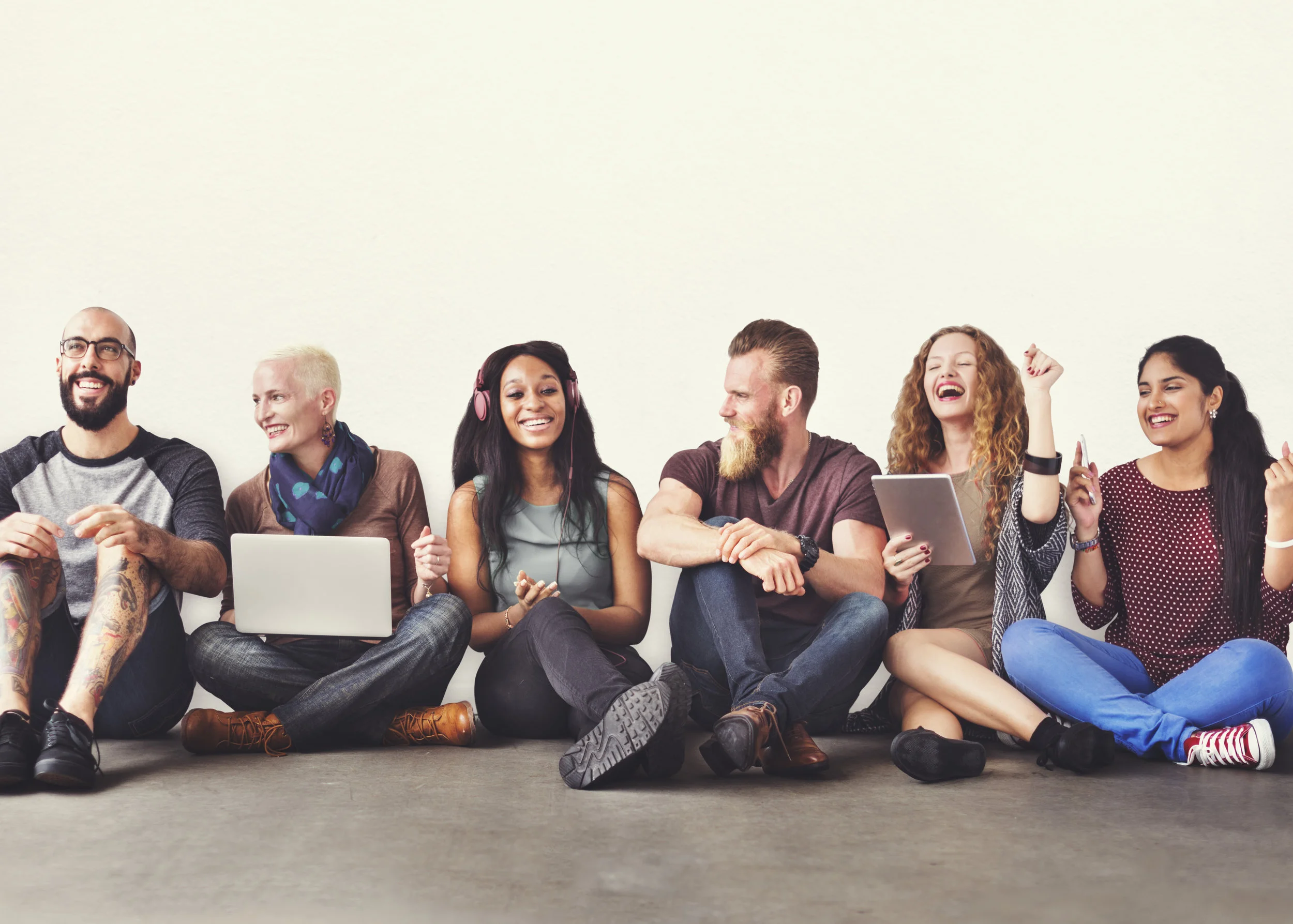 Diverse-People-Friendship-Digital-Device-Connection-Concept-668519050_5372x3840.jpeg