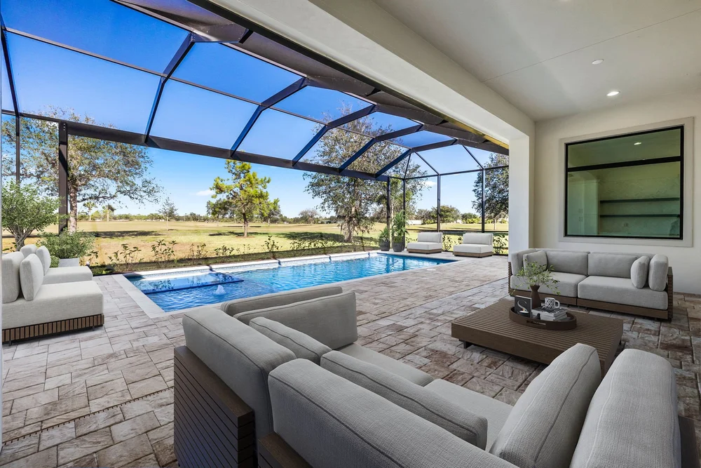 Pinnacle custom home outdoor living area in River Hall Country Club