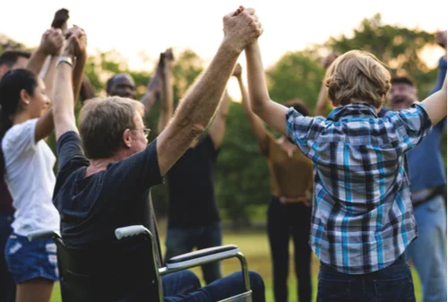 people holding hands support