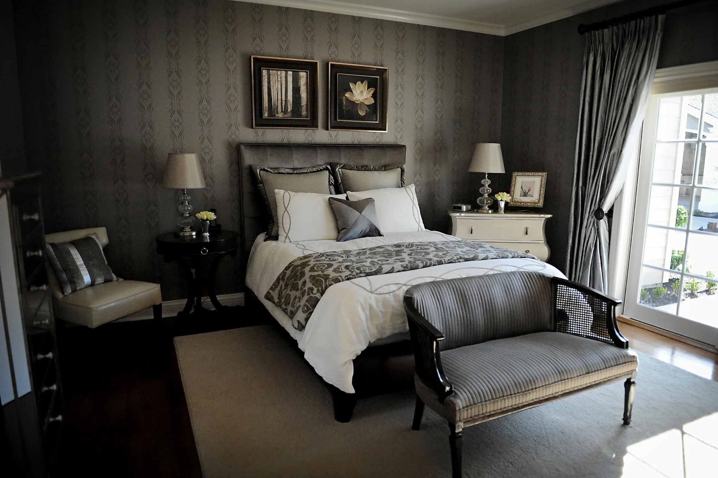 Stylish master’s bedroom with sofa and a painting