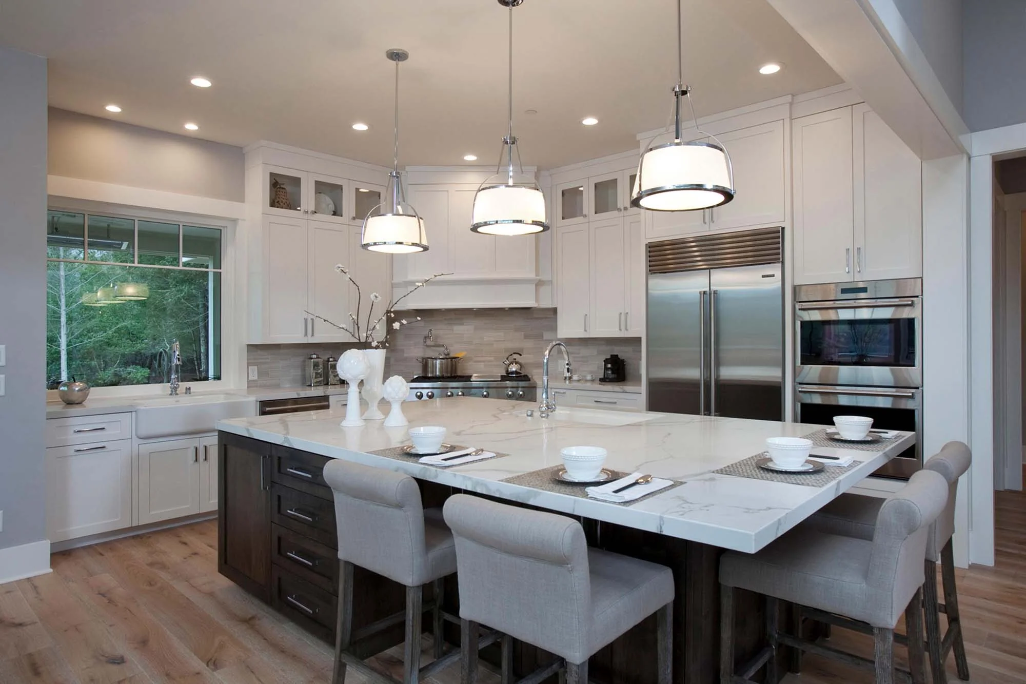 Stylish kitchen with chairs and kitchenware