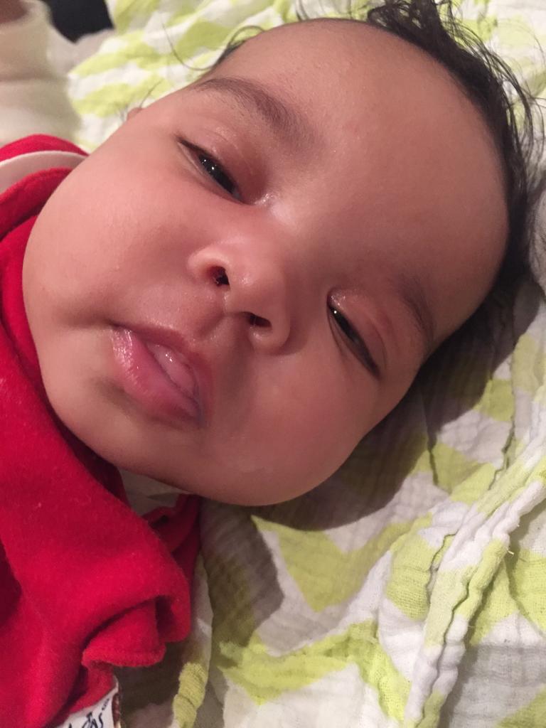 Baby milk drunk - clearly satisfied after a feed