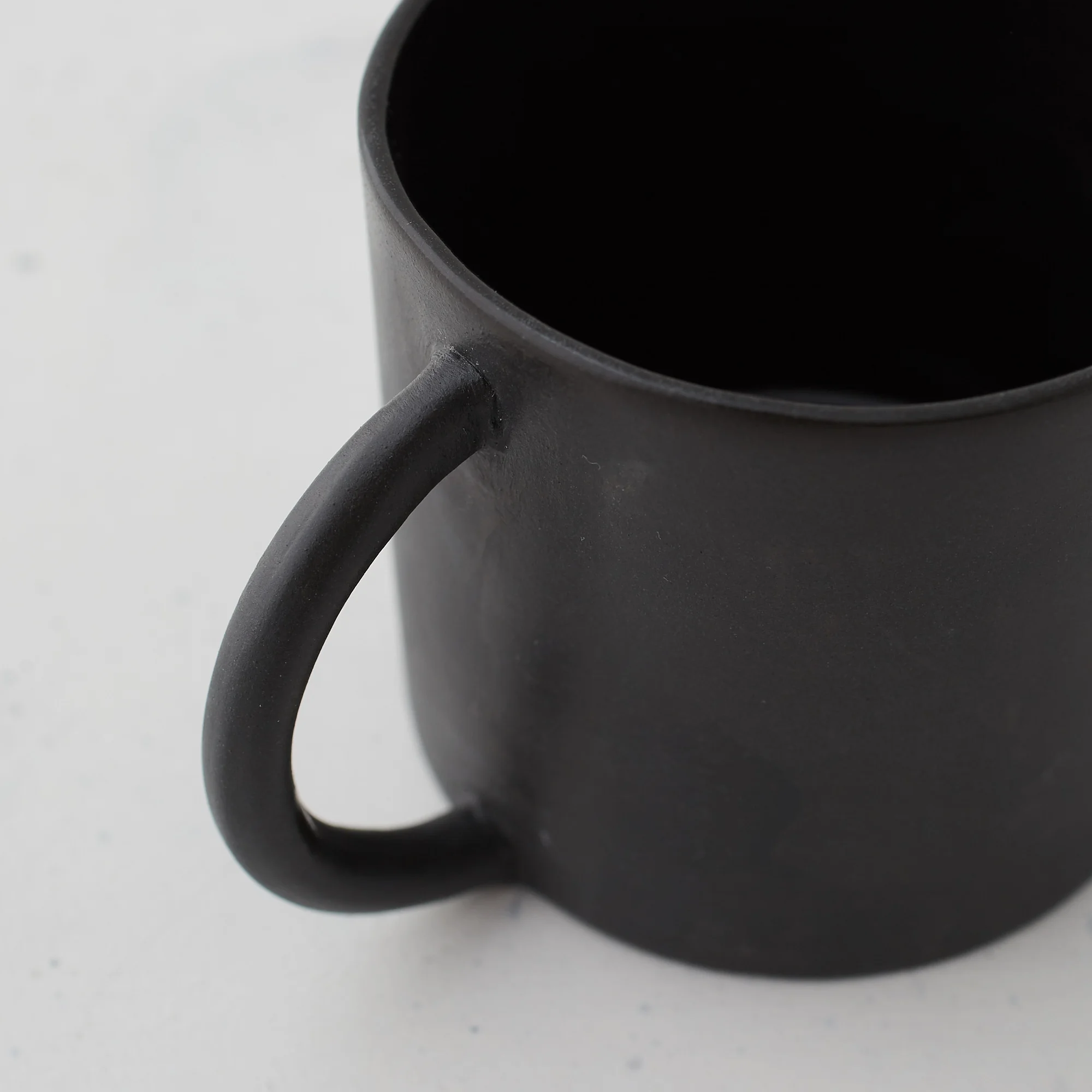 Georgie-Scully-Ceramics-black-small-cup-close-up.jpg