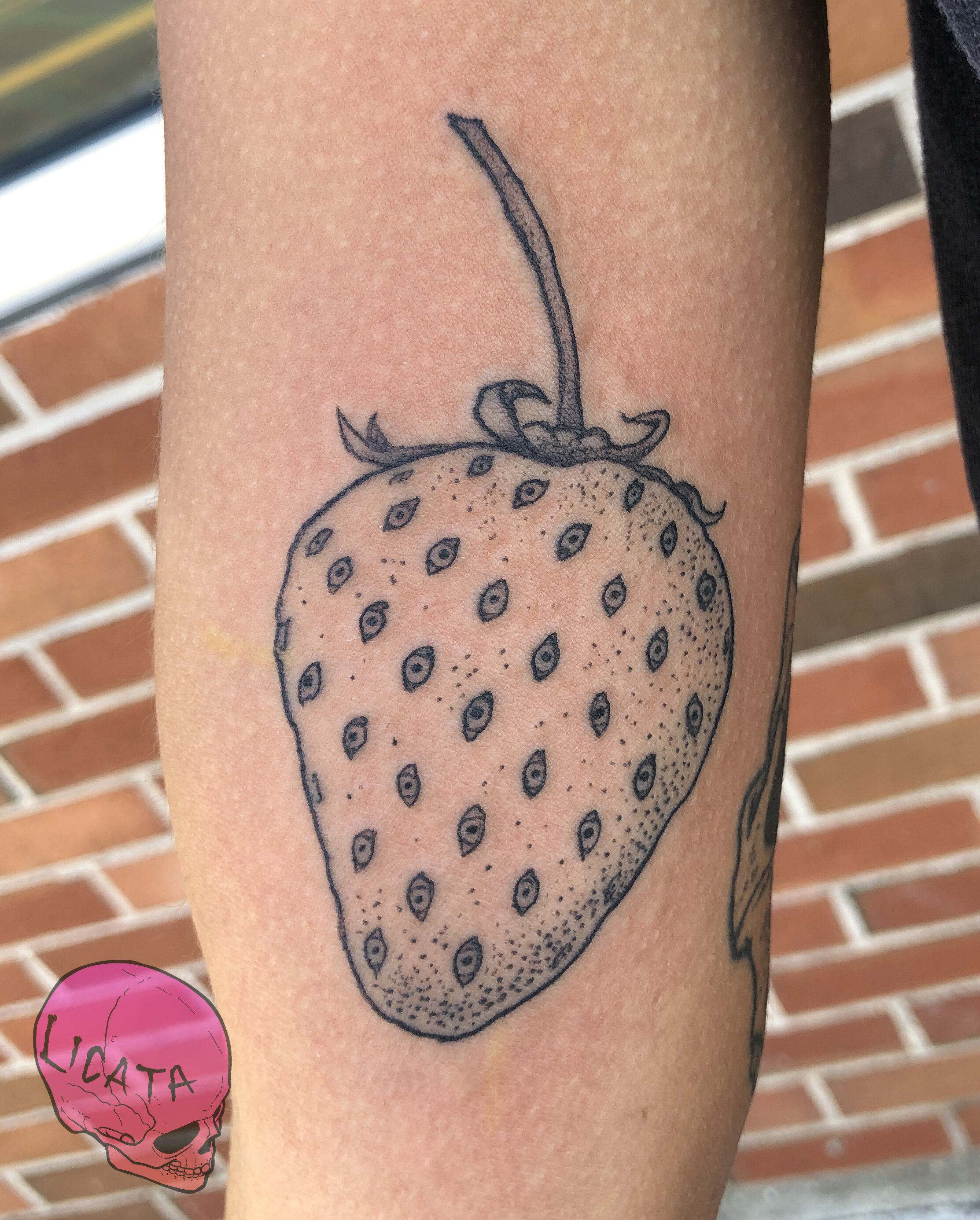 strawberry_with_eyes_tattoo.jpg