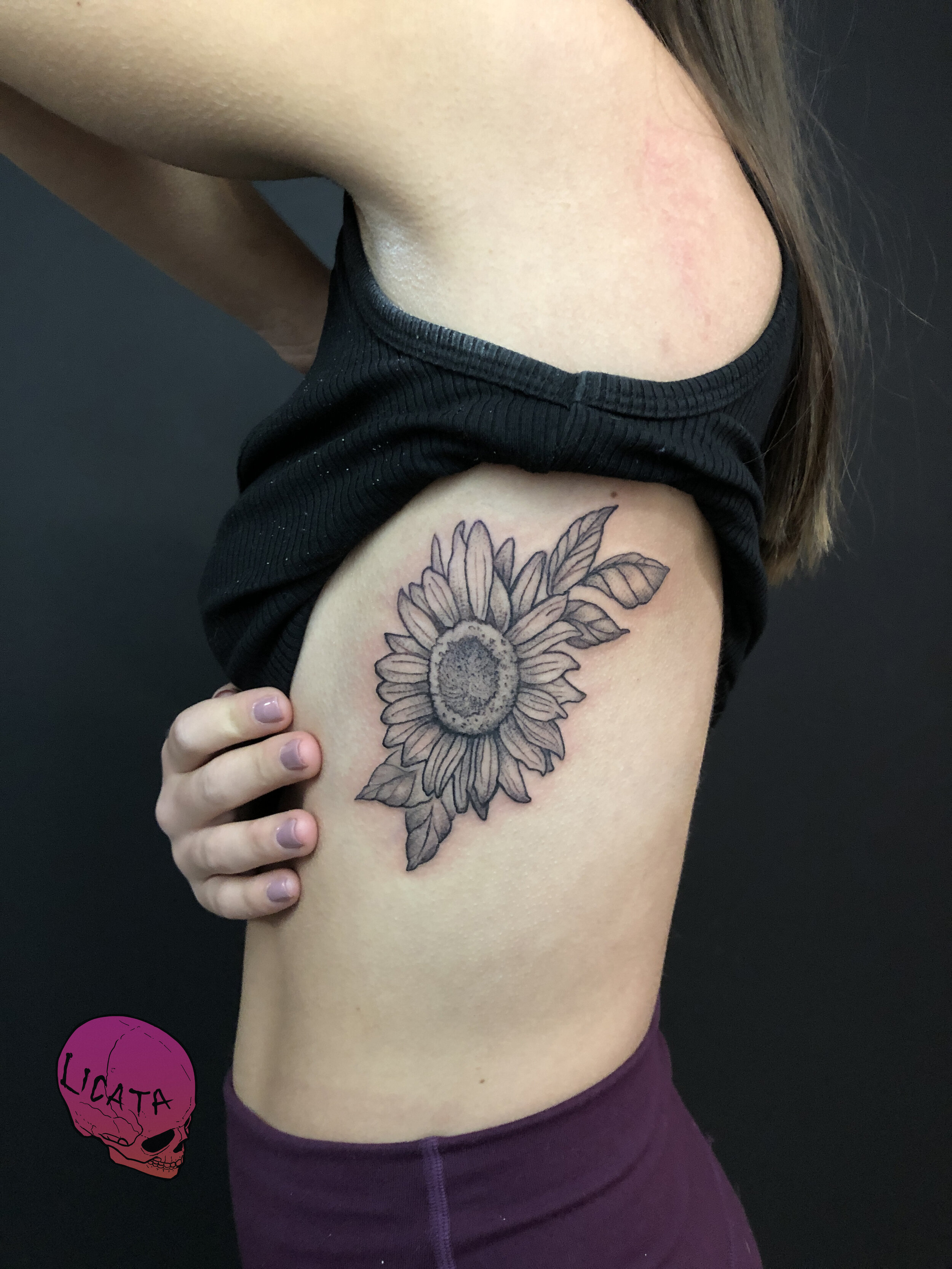 sunflower_tattoo_on_ribs.jpg