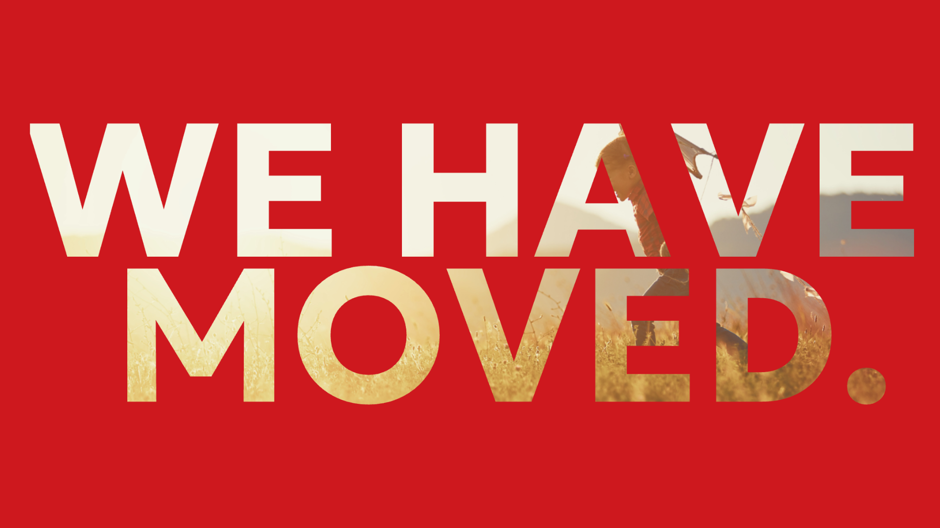 Text overlay on a red background reading 'We have moved' with a background image of a person skateboarding in a field at sunset.