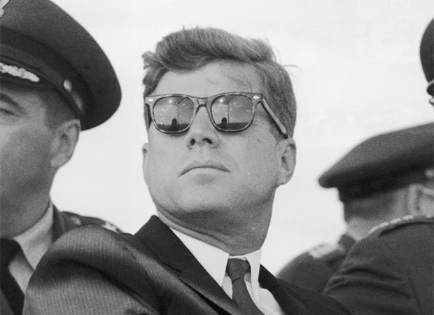 President John F. Kennedy pulling off the Ray Ban Wayfarer.