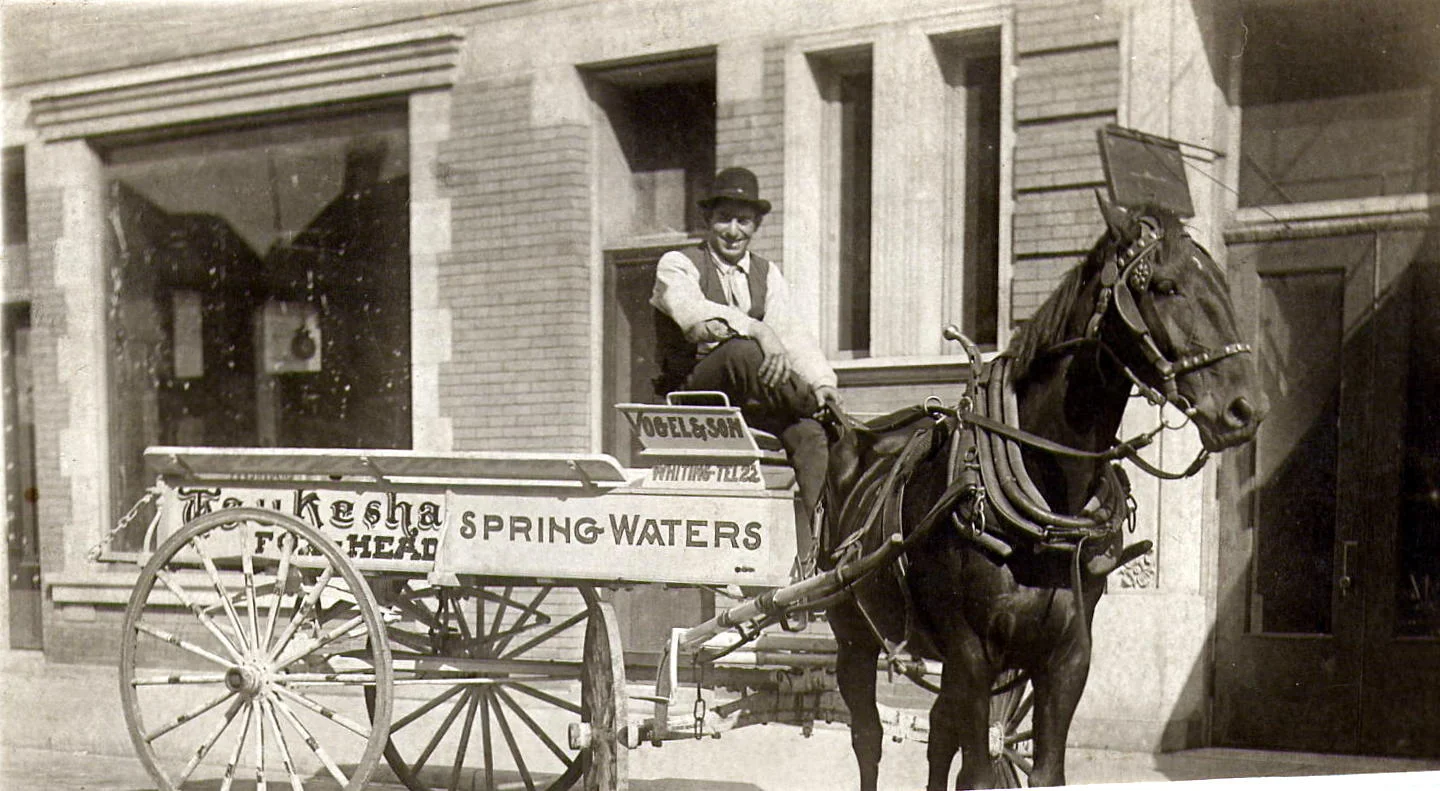 Fred Vogel driving his Vogel & Son beer delivery wagon.