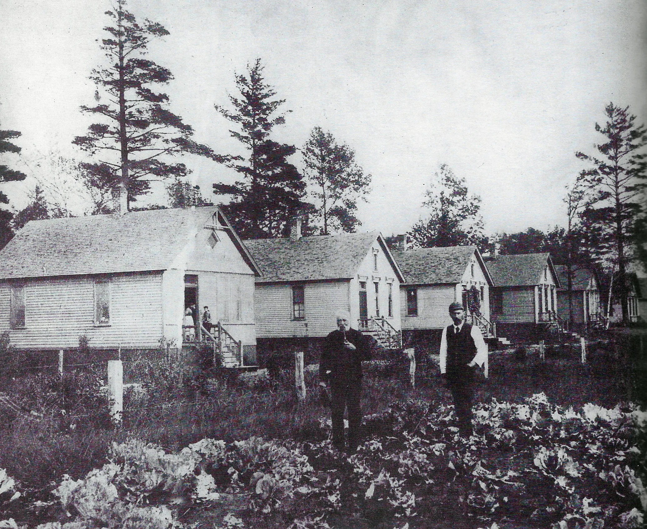 The Eggers family owned property along Berry Lake, which was located on Whiting’s far east side on land that is now largely a part of the BP Refinery. The Eggers operated a business on Berry Lake which sold ice that they cut from the lake in the winter months. When Standard Oil arrived in 1889, they used some of the money they made from the sale of their land to the refinery, to build seventeen houses on their remaining land on Berry Lake. Henry Eggers Sr., who was born around 1817 in Germany, is in the center of this photo in front of the houses he had built. To his side is believed to be Henry Eggers Jr., in a photo from the 1890s.