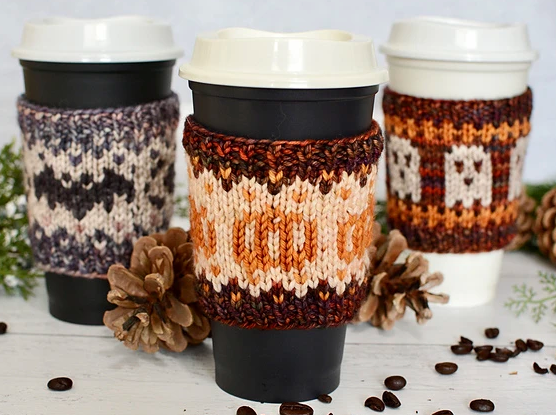 knit drink cozies with pumpkin, ghost and bat
