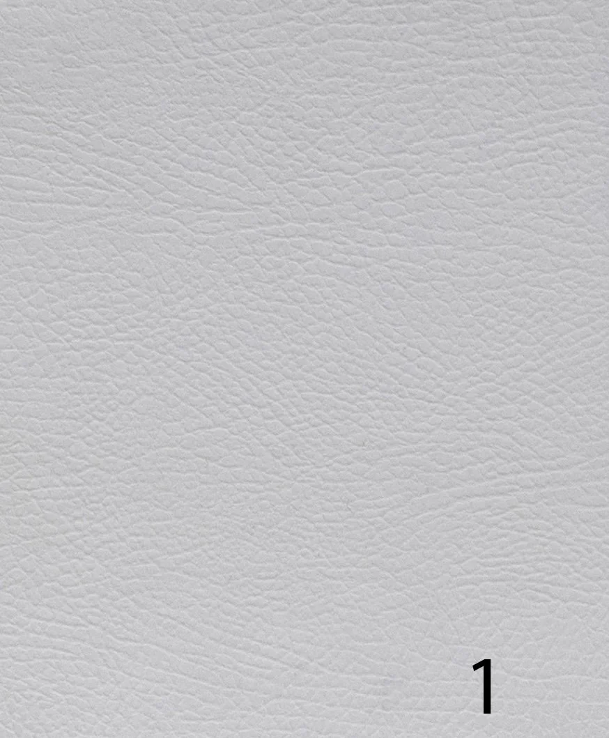 Close-up of white textured paper surface with a small black number 1 at the bottom right corner.